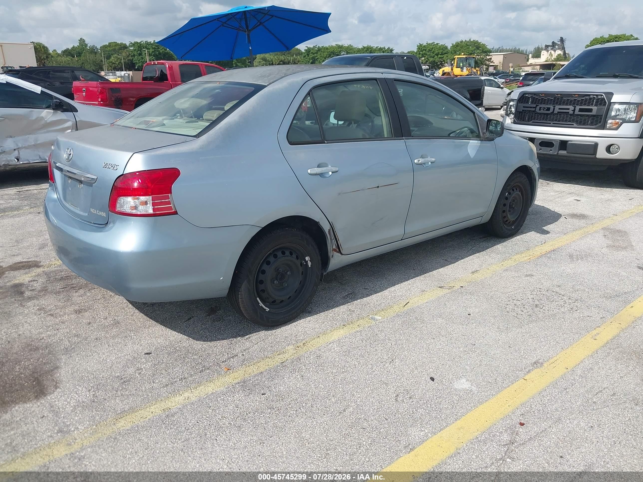 2009 Toyota Yaris   Blue vin: JTDBT903391313131