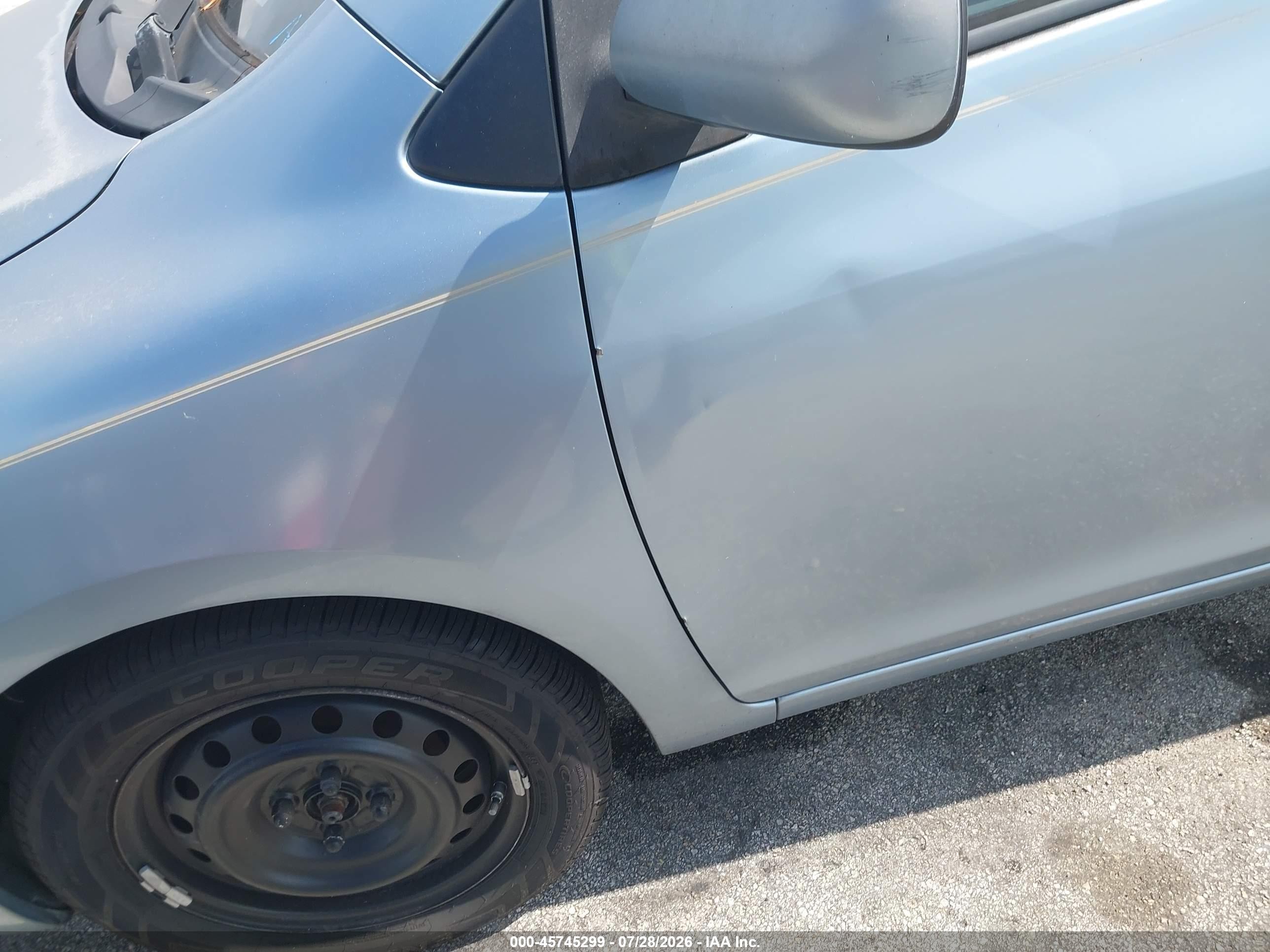 2009 Toyota Yaris   Blue vin: JTDBT903391313131
