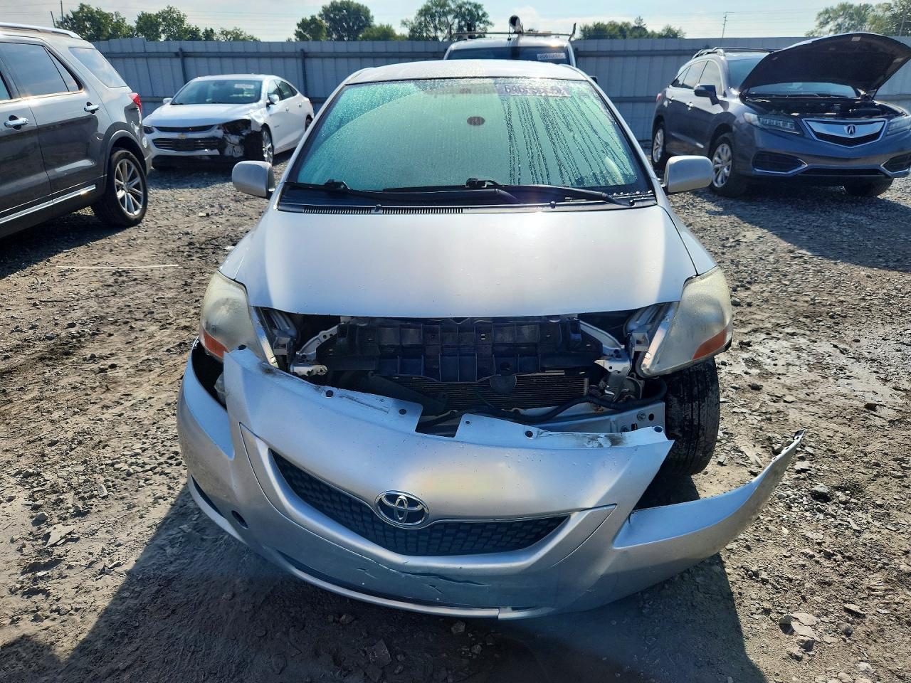 2009 Toyota Yaris Base Gray vin: JTDBT903391316997