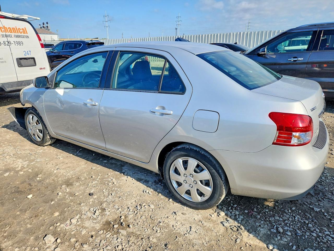 2009 Toyota Yaris Base Gray vin: JTDBT903391316997