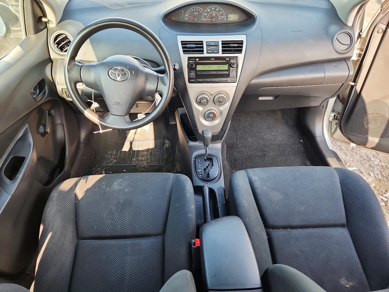 2009 Toyota Yaris Base Gray vin: JTDBT903391316997