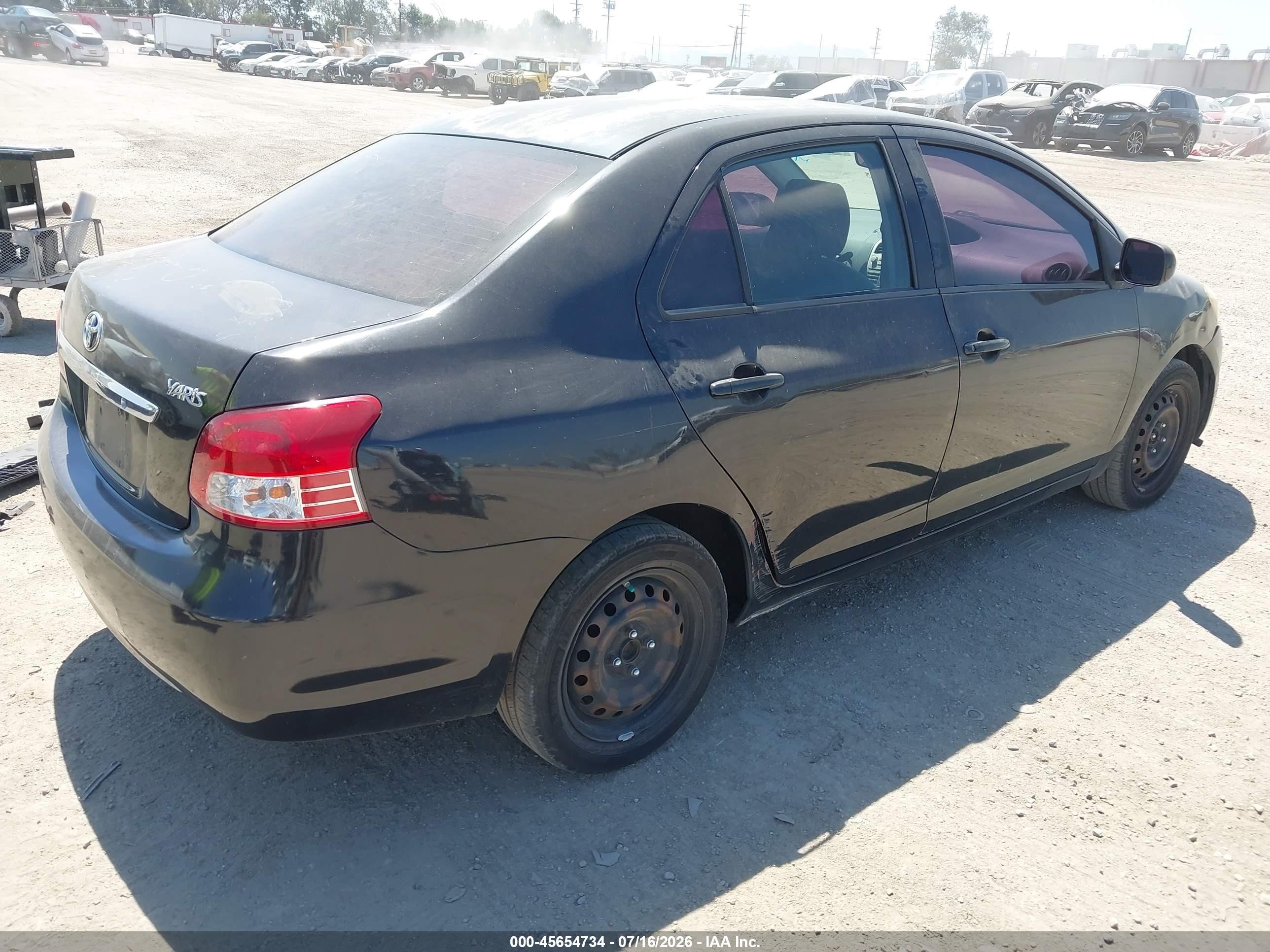 2009 Toyota Yaris   Black vin: JTDBT903391332018