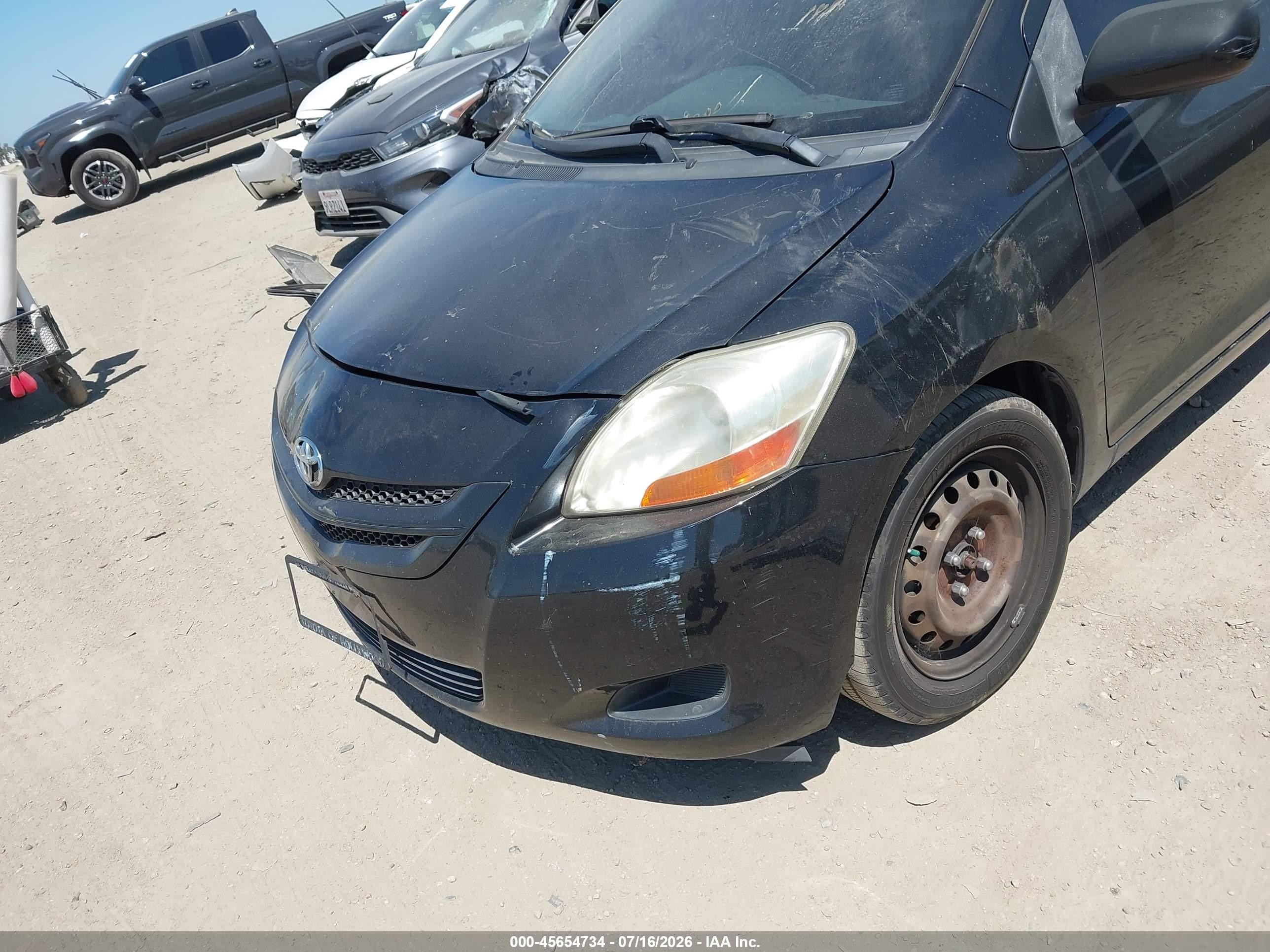 2009 Toyota Yaris   Black vin: JTDBT903391332018