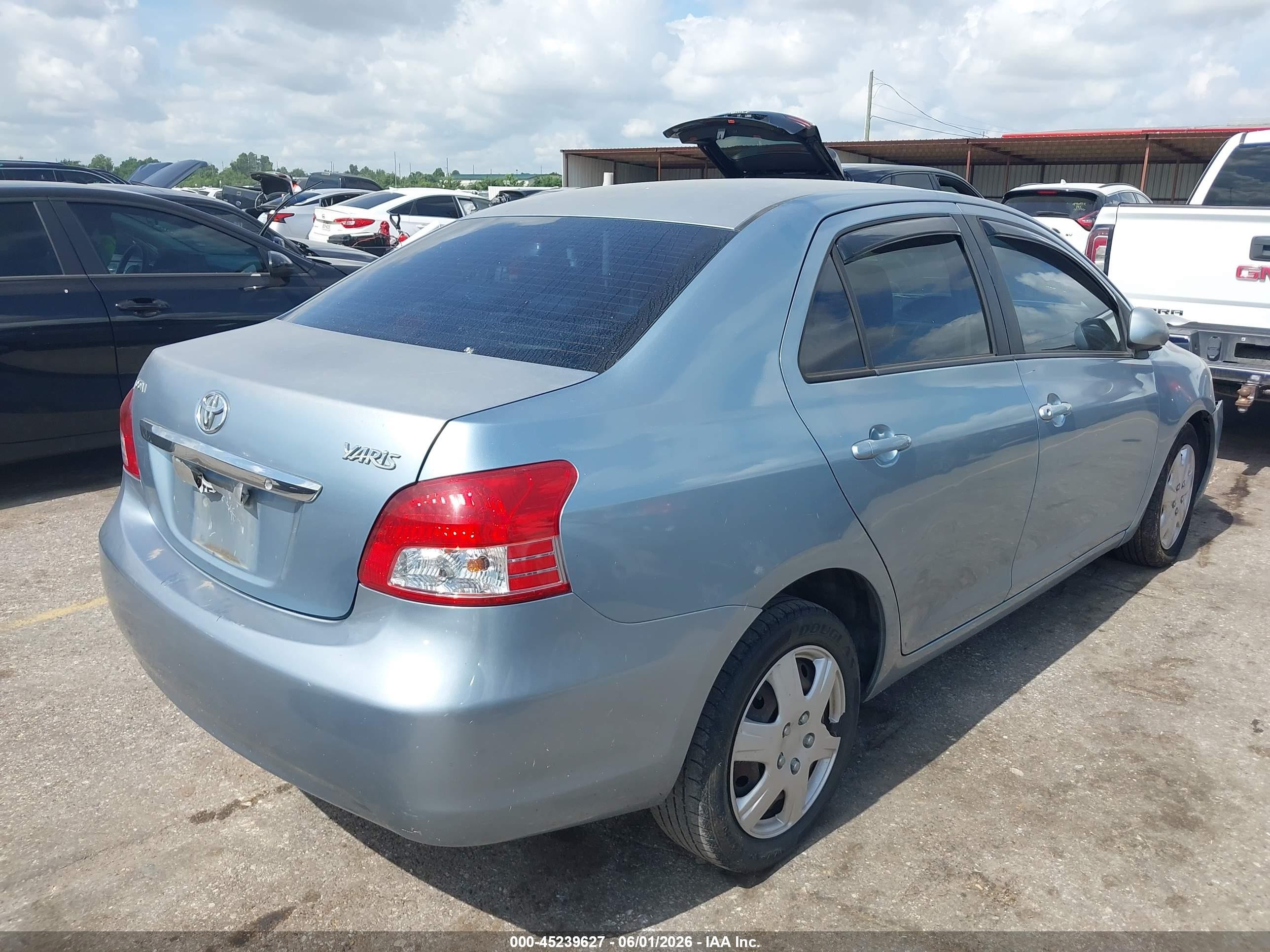 2009 Toyota Yaris   Light Blue vin: JTDBT903391332150