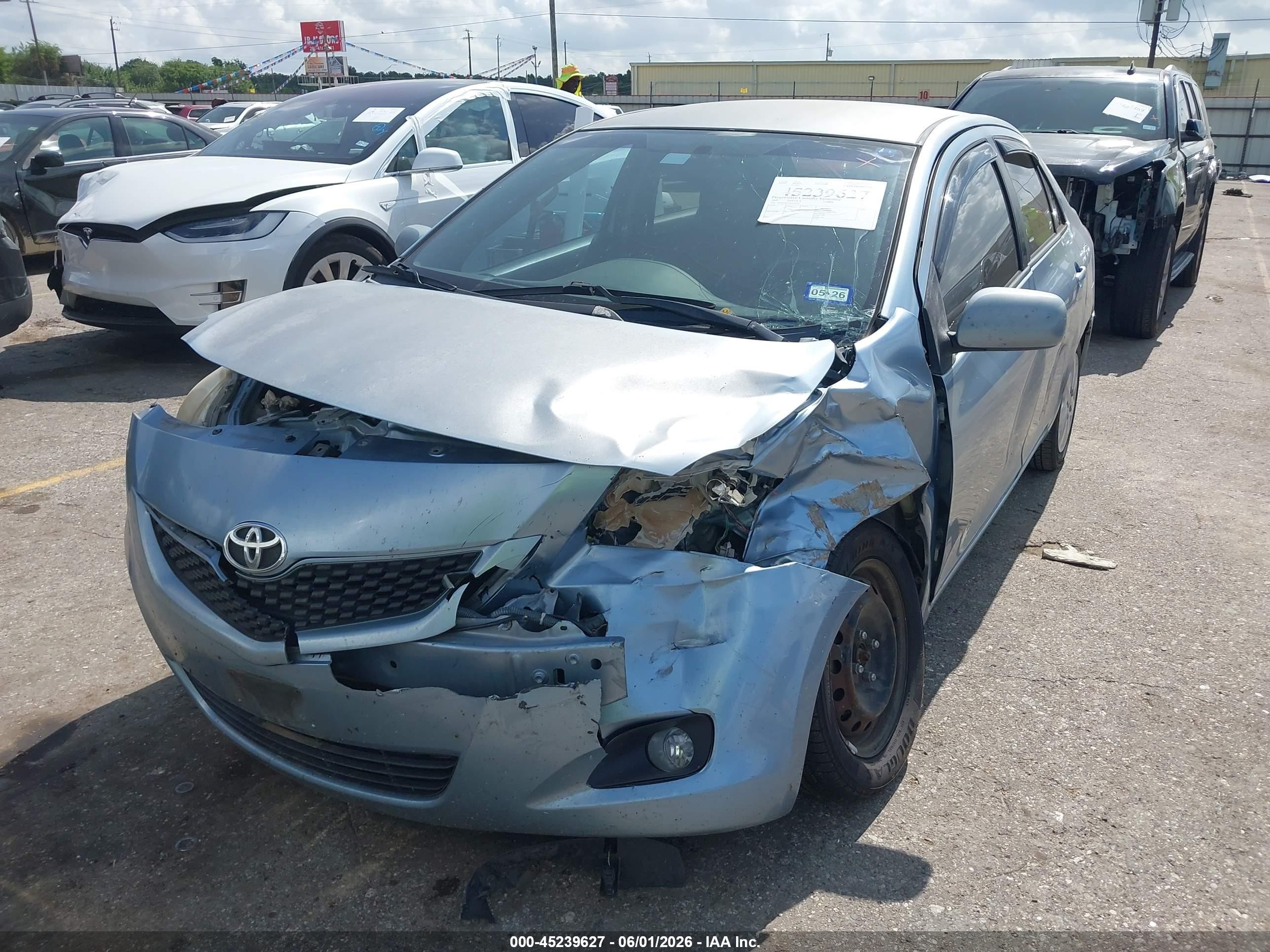 2009 Toyota Yaris   Light Blue vin: JTDBT903391332150