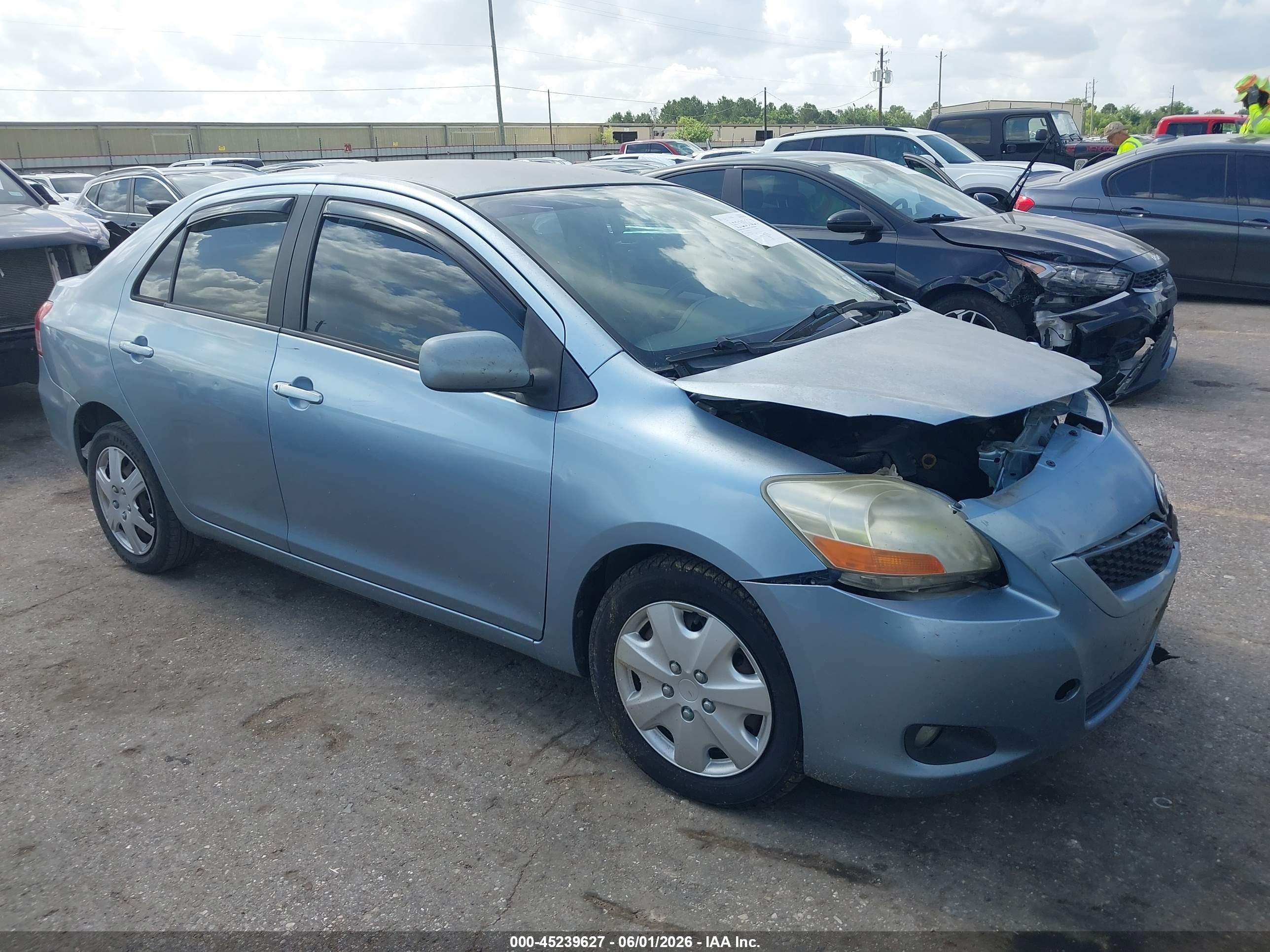 2009 Toyota Yaris   Light Blue vin: JTDBT903391332150