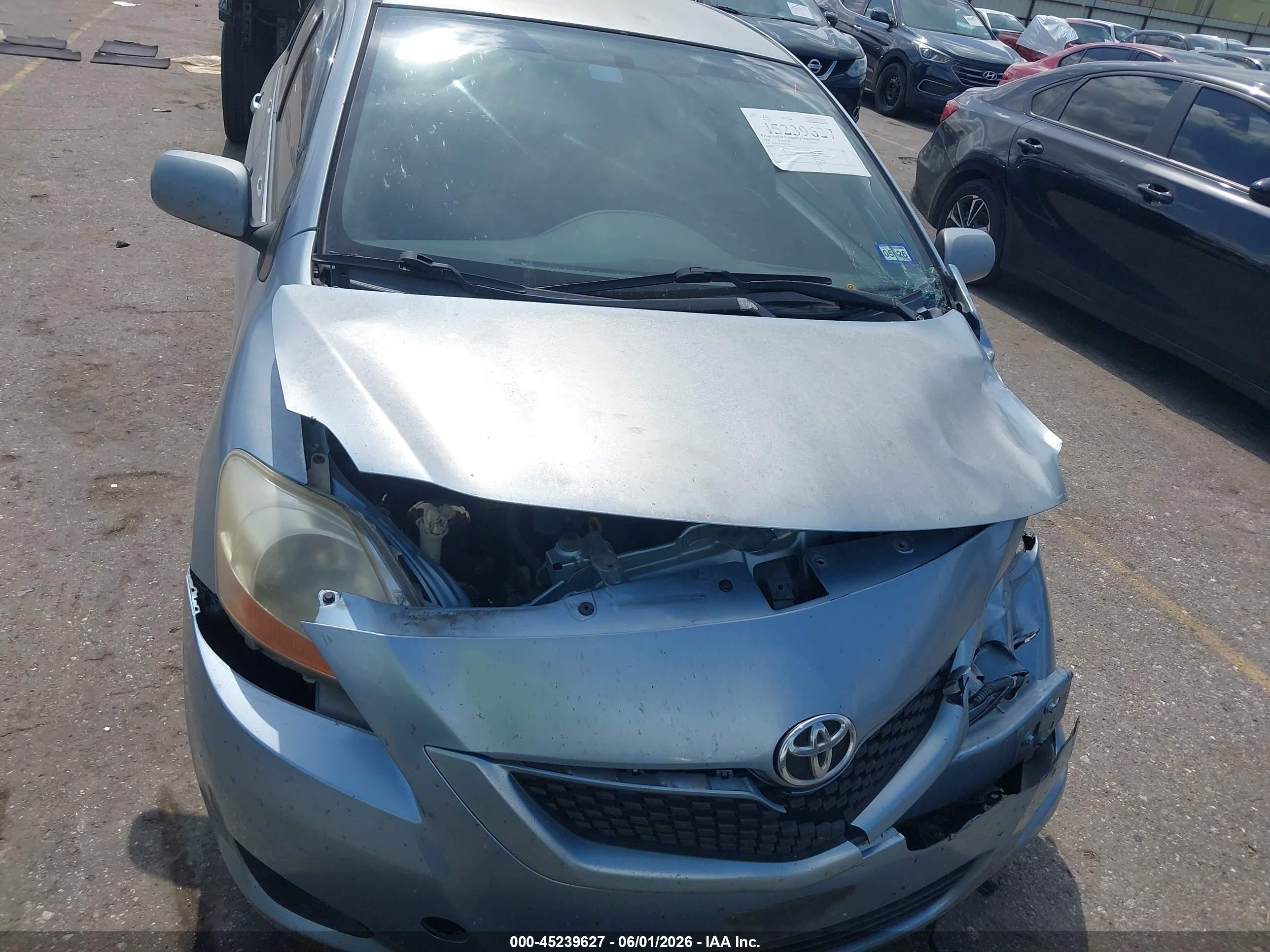 2009 Toyota Yaris   Light Blue vin: JTDBT903391332150