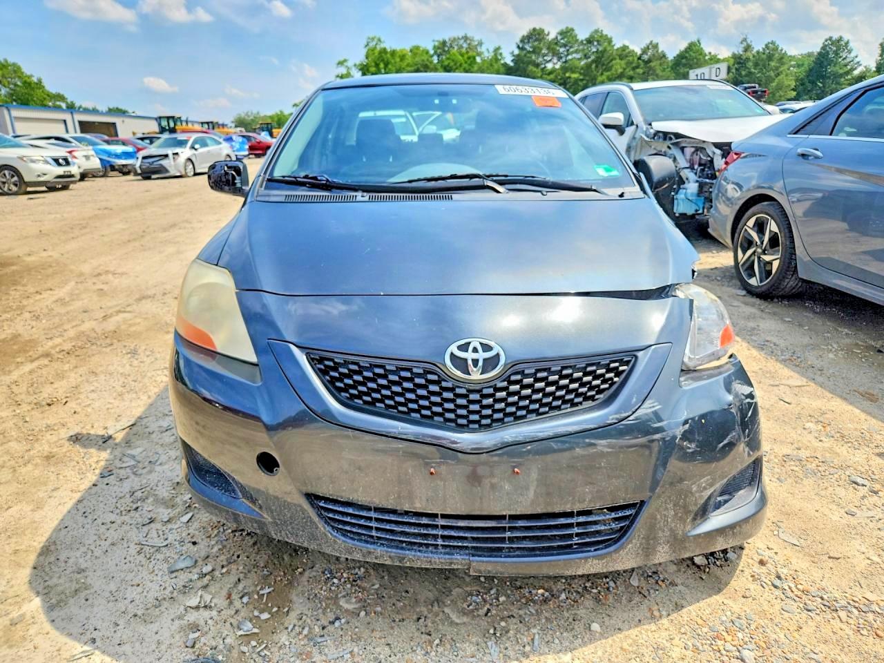 2009 Toyota Yaris Base Charcoal vin: JTDBT903391335680
