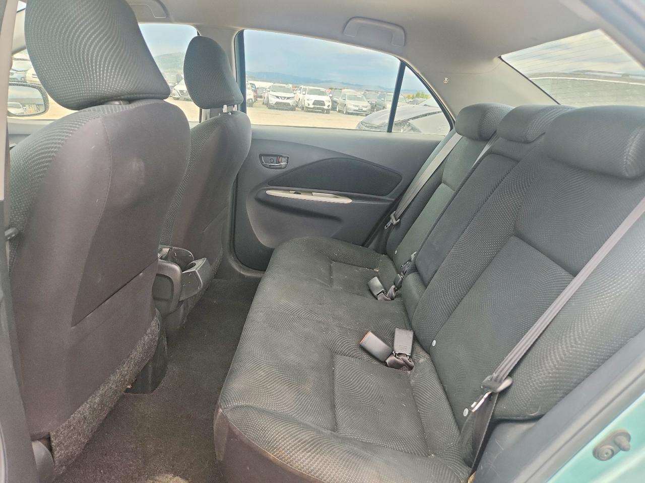 2009 Toyota Yaris Base Green vin: JTDBT903494046483