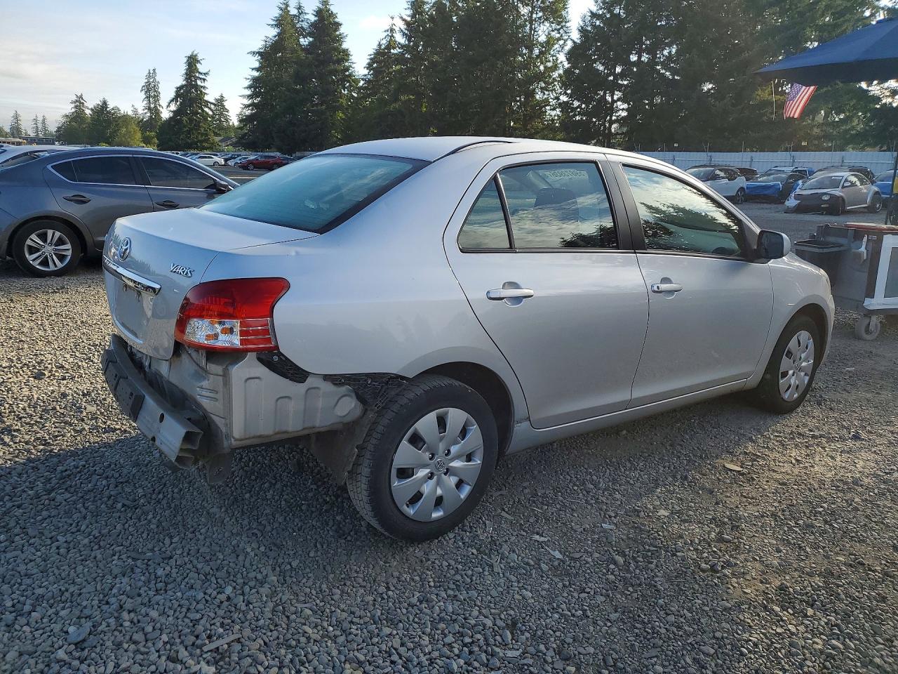 2009 Toyota Yaris Base Silver vin: JTDBT903494047360