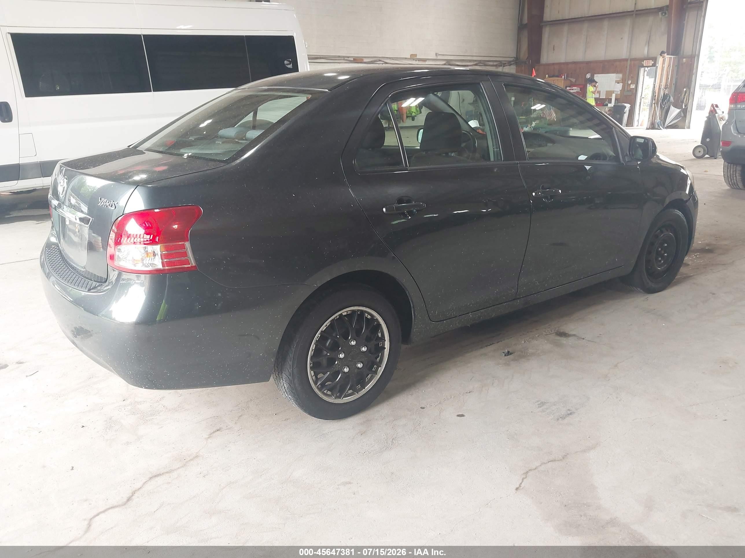 2009 Toyota Yaris   Gray vin: JTDBT903494050159