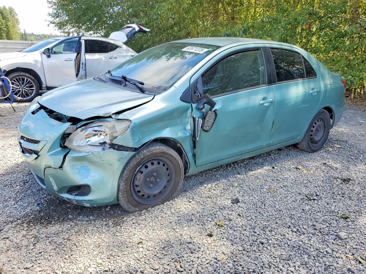 2007 Toyota Yaris Base Turquoise vin: JTDBT903571082617