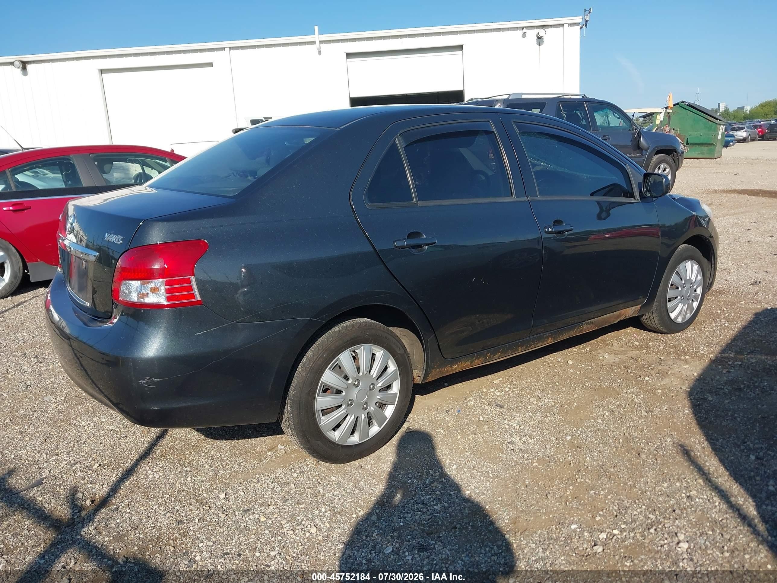 2009 Toyota Yaris   Black vin: JTDBT903591307041