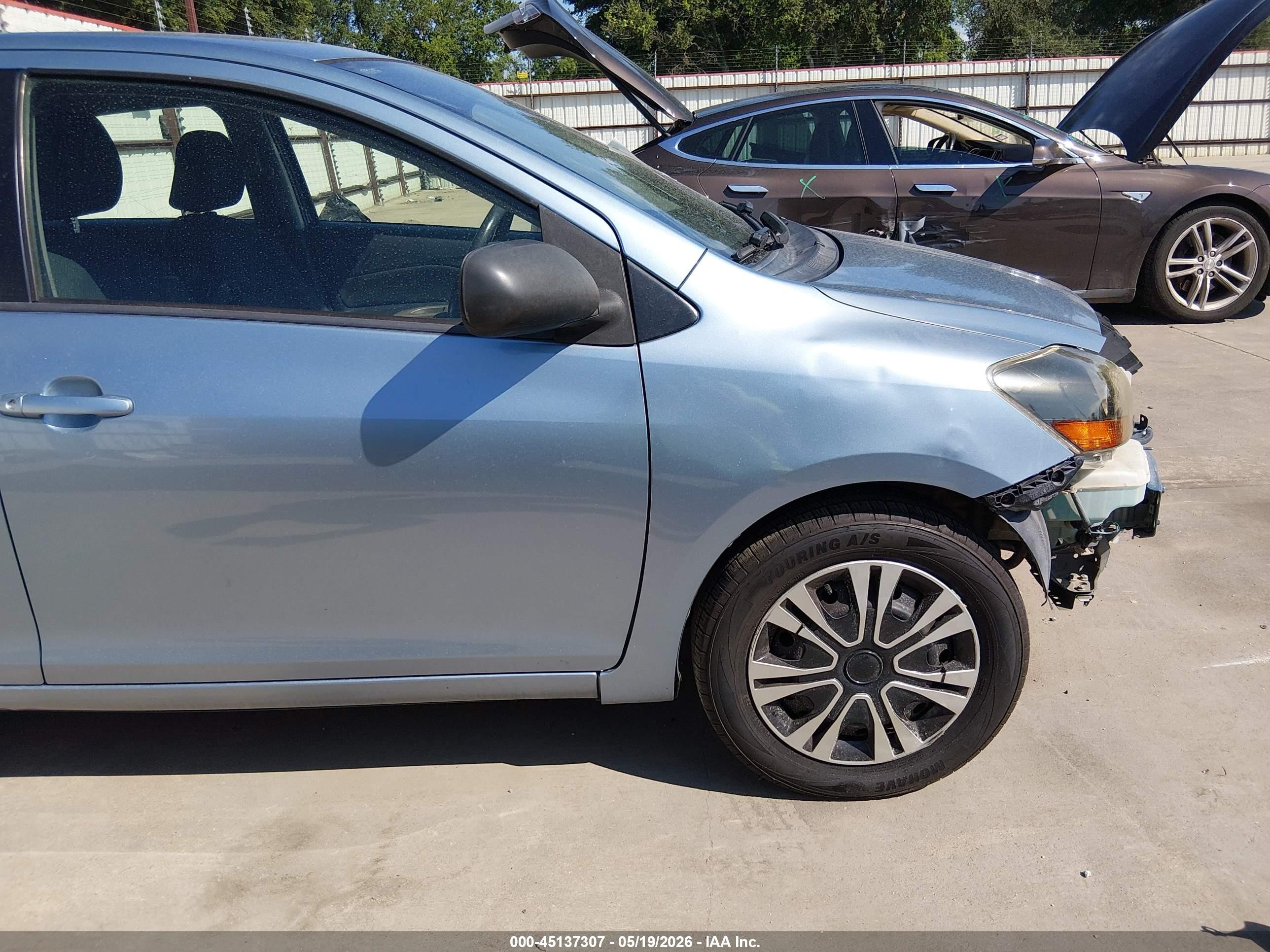 2009 Toyota Yaris   Light Blue vin: JTDBT903591307475
