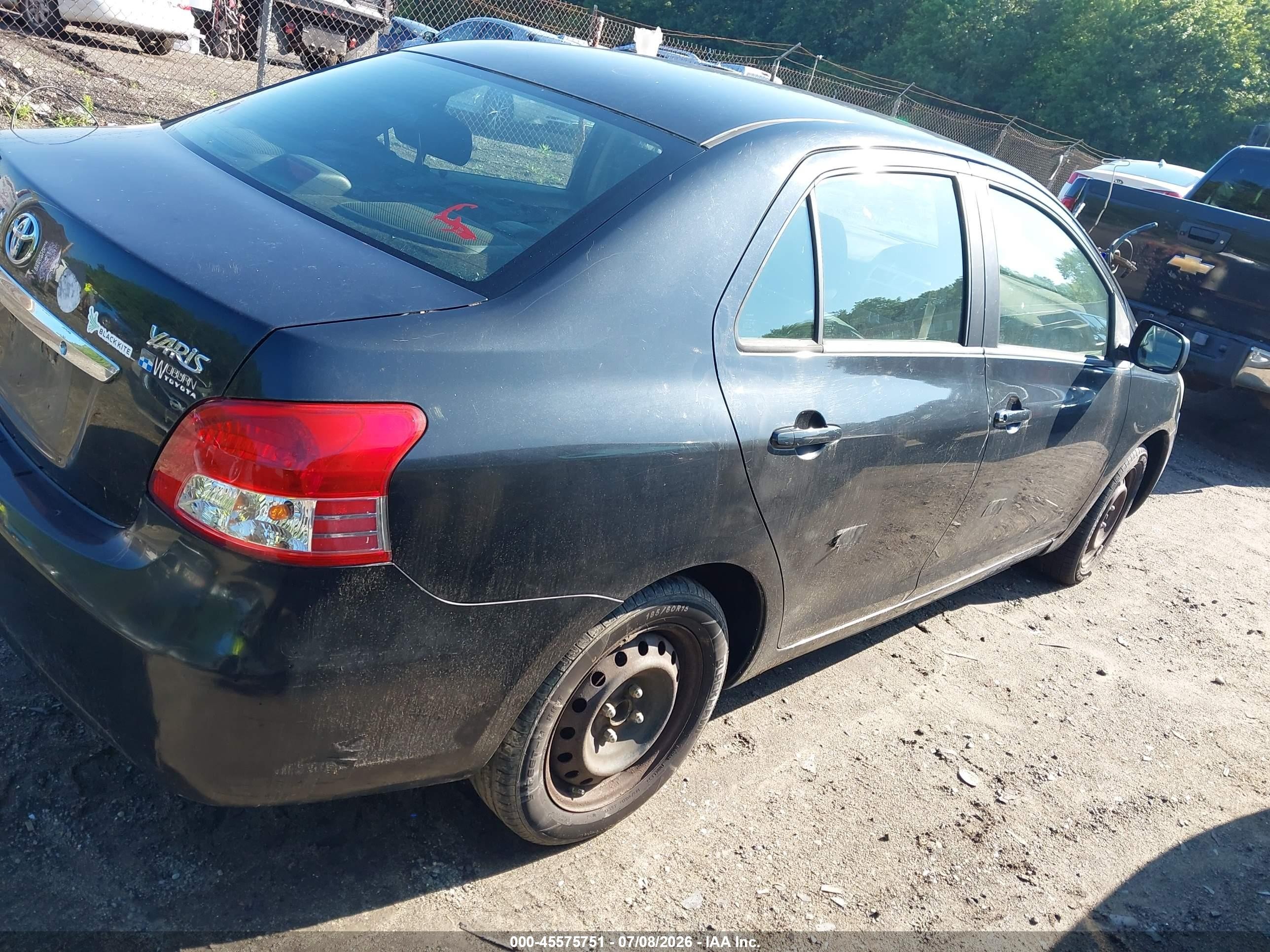 2009 Toyota Yaris   Black vin: JTDBT903591324437