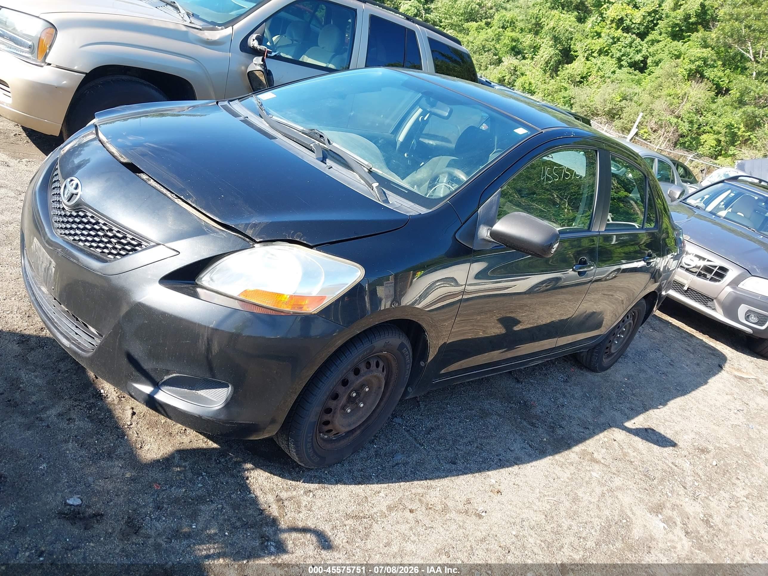 2009 Toyota Yaris   Black vin: JTDBT903591324437