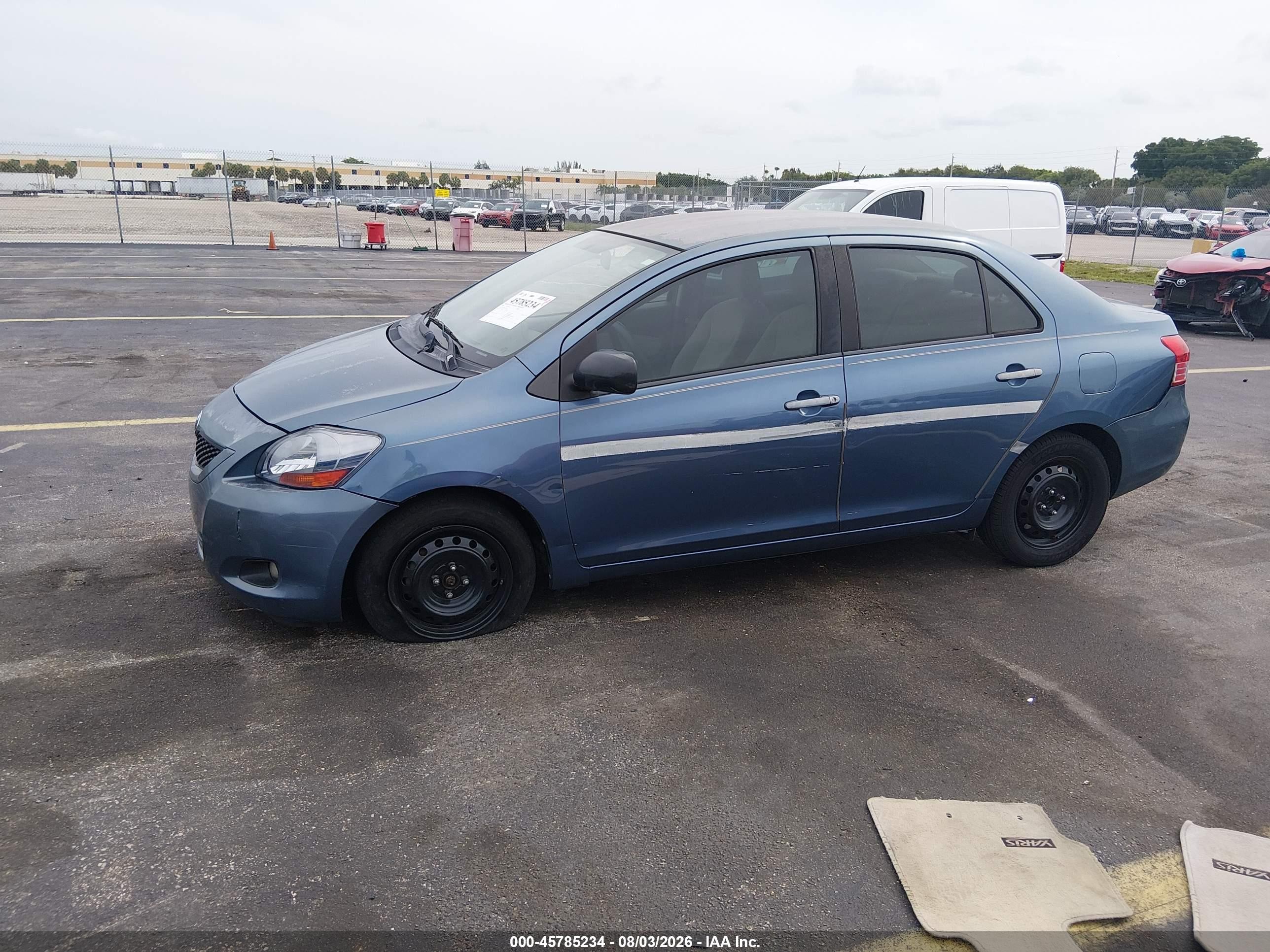 2009 Toyota Yaris Blue vin: JTDBT903691297555