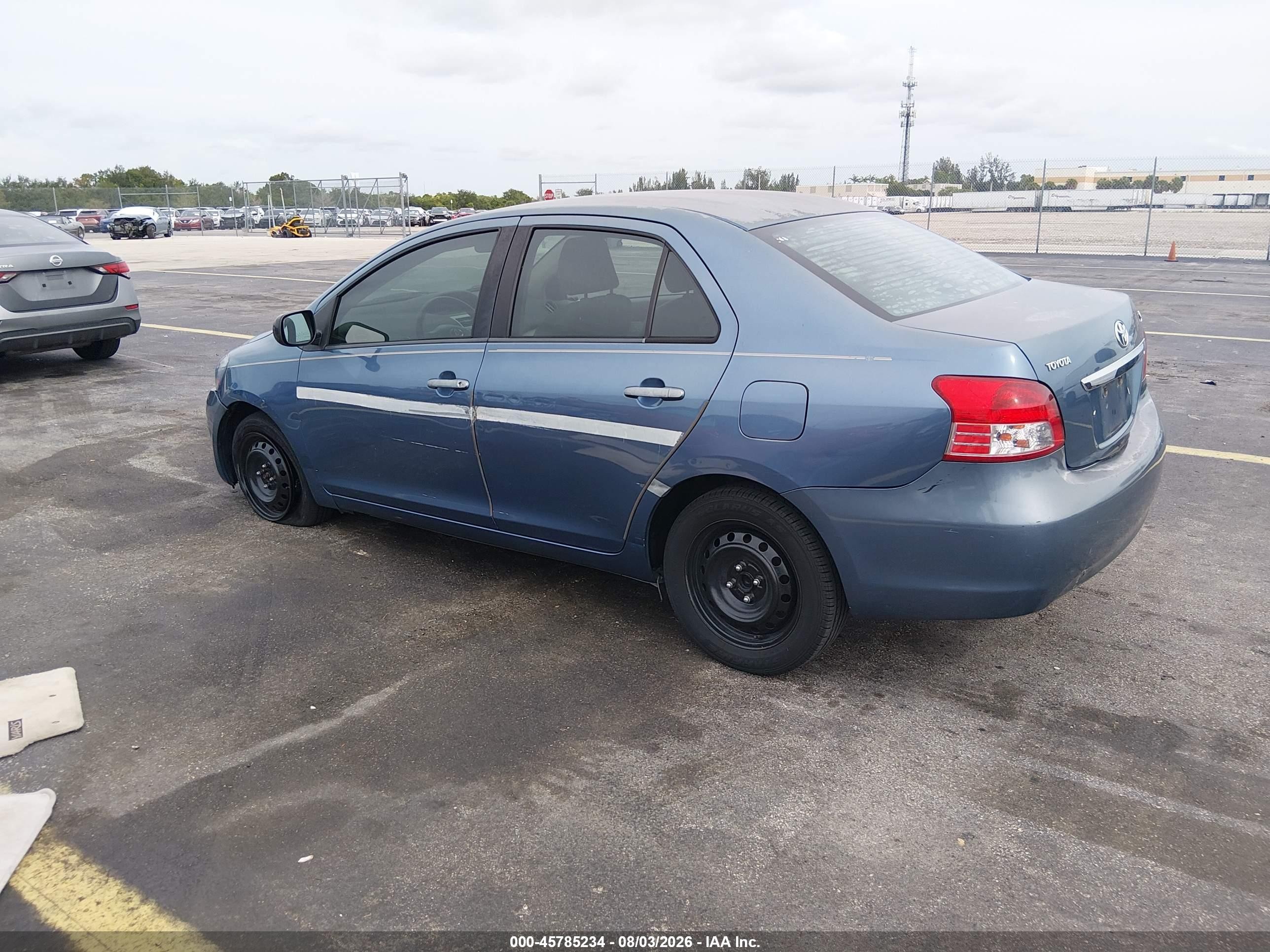 2009 Toyota Yaris Blue vin: JTDBT903691297555