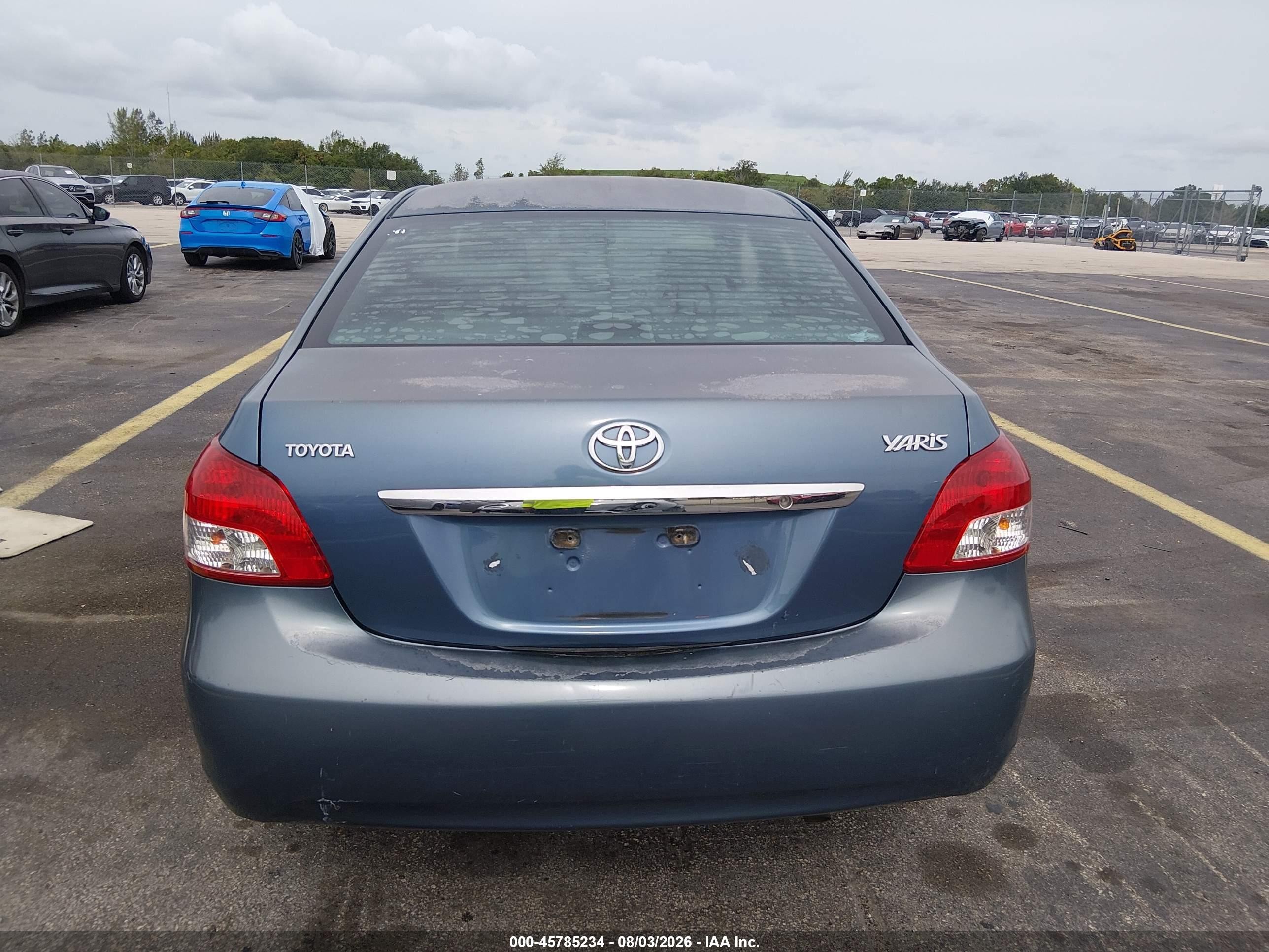 2009 Toyota Yaris Blue vin: JTDBT903691297555