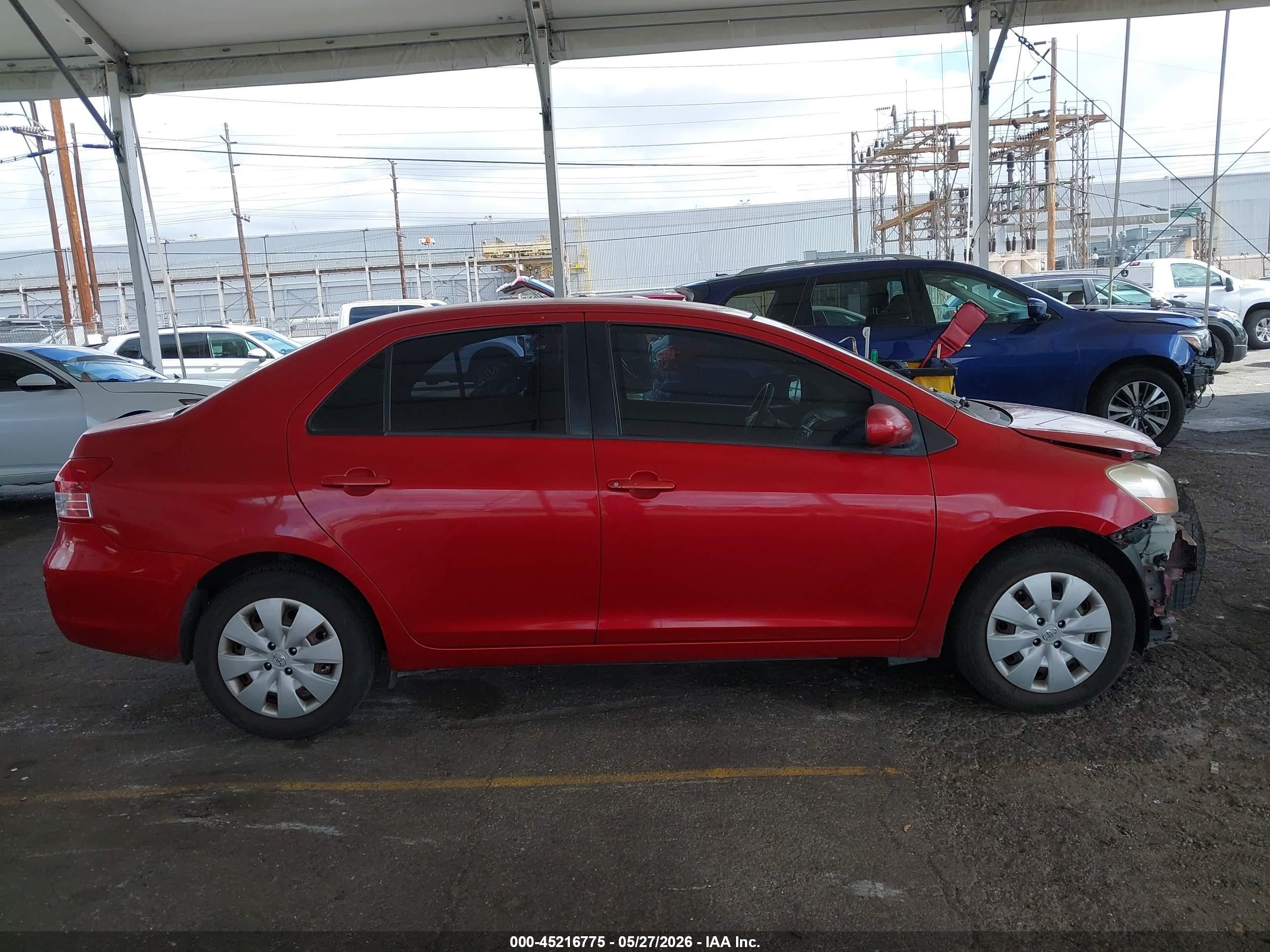 2009 Toyota Yaris   Красный vin: JTDBT903691342672
