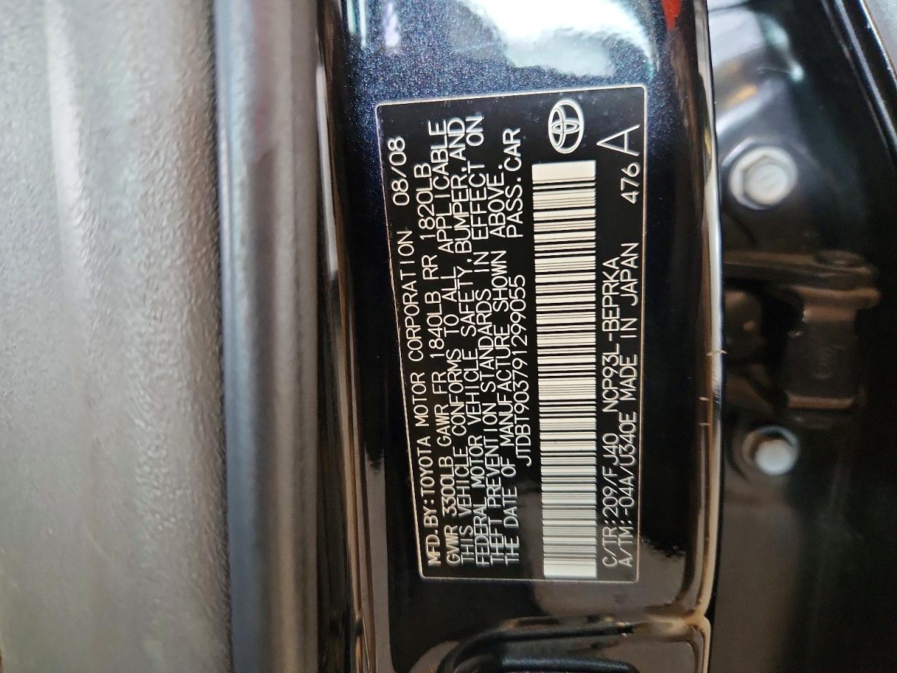 2009 Toyota Yaris Base Black vin: JTDBT903791299055