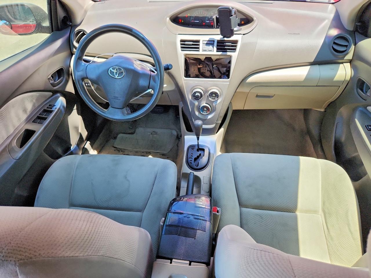2009 Toyota Yaris Base Red vin: JTDBT903791339571