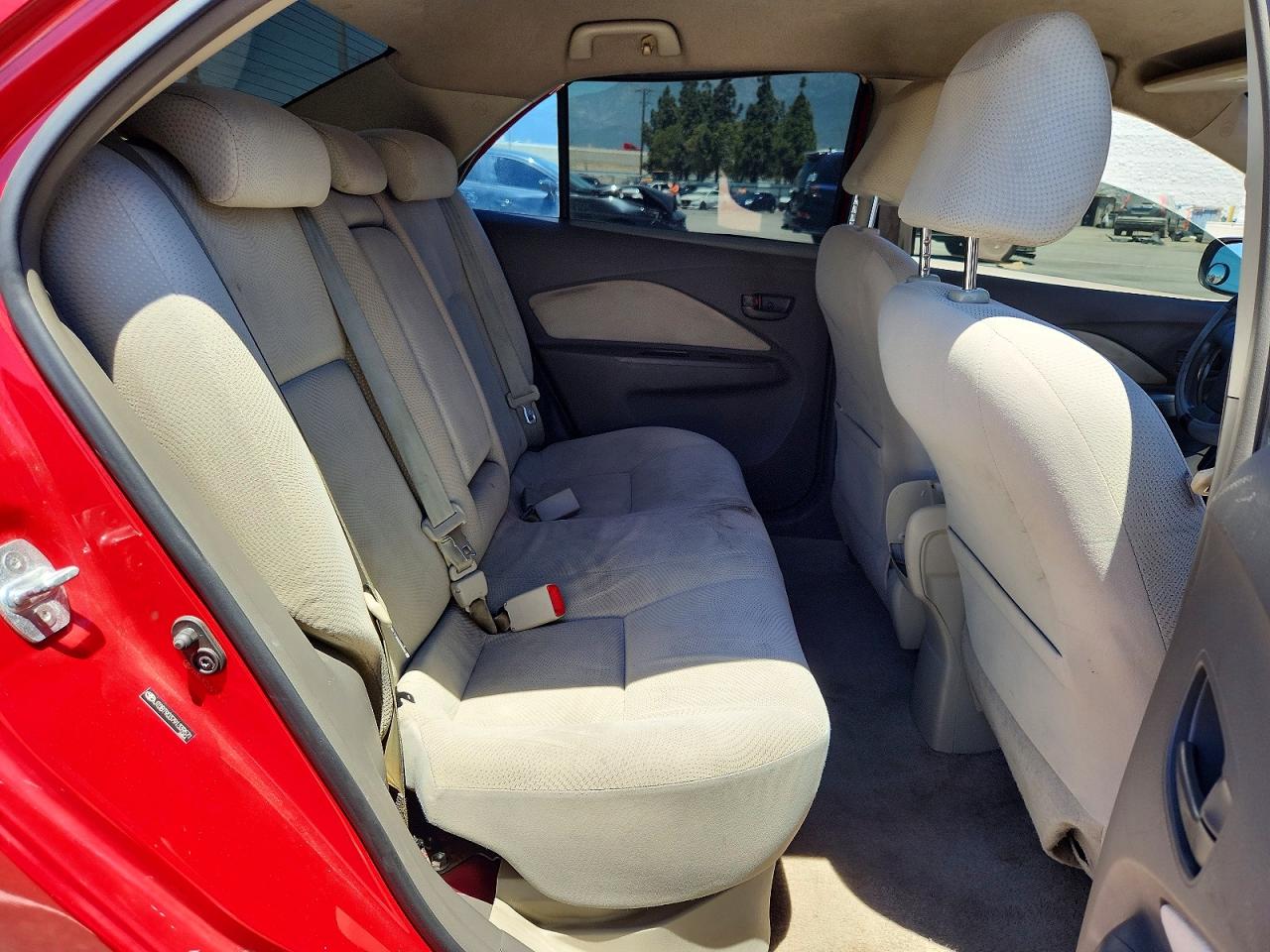 2009 Toyota Yaris Base Red vin: JTDBT903791339571