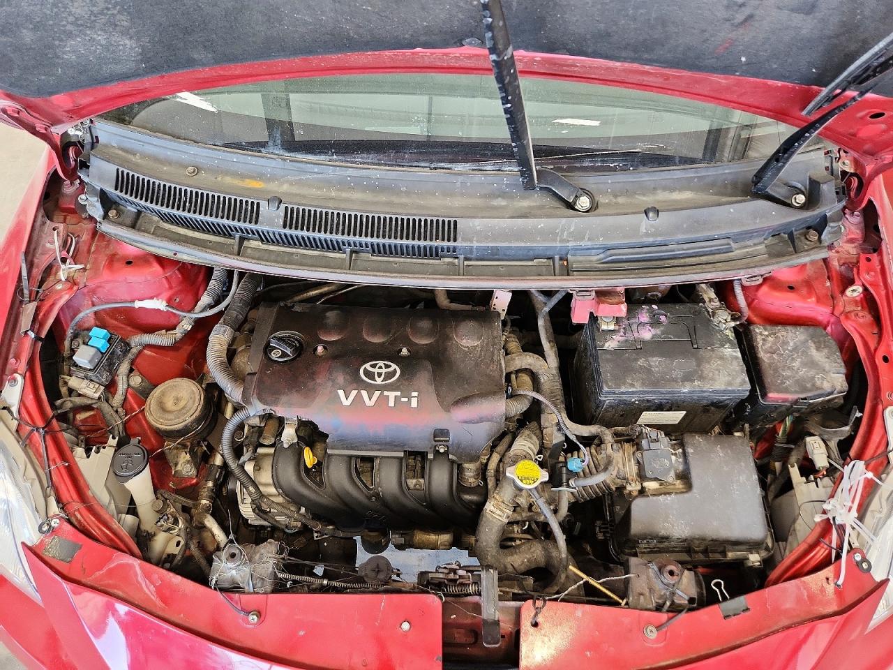 2008 Toyota Yaris Base Burgundy vin: JTDBT903881244046