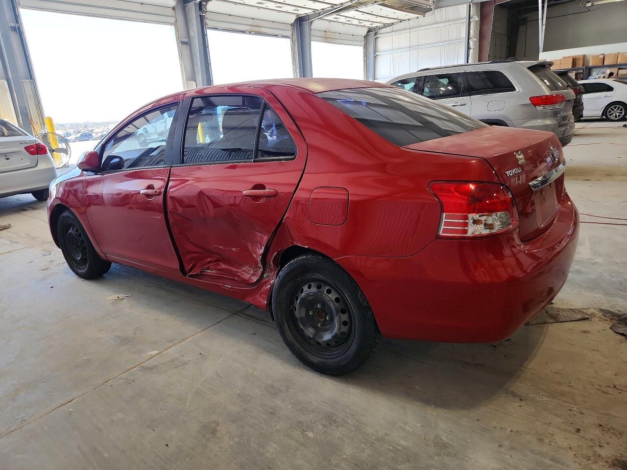 2008 Toyota Yaris Base Burgundy vin: JTDBT903881244046