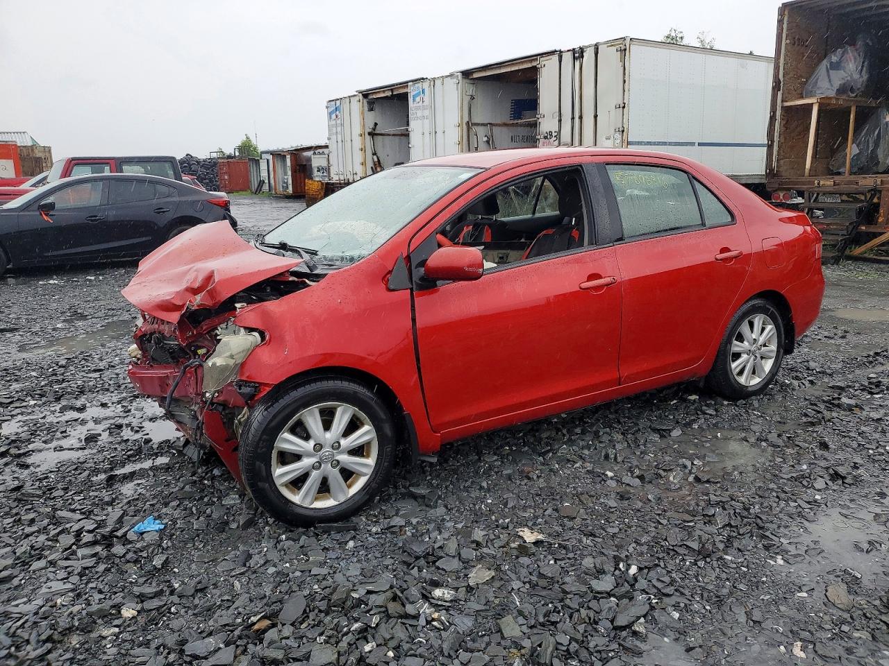 2009 Toyota Yaris Base Red vin: JTDBT903991335862