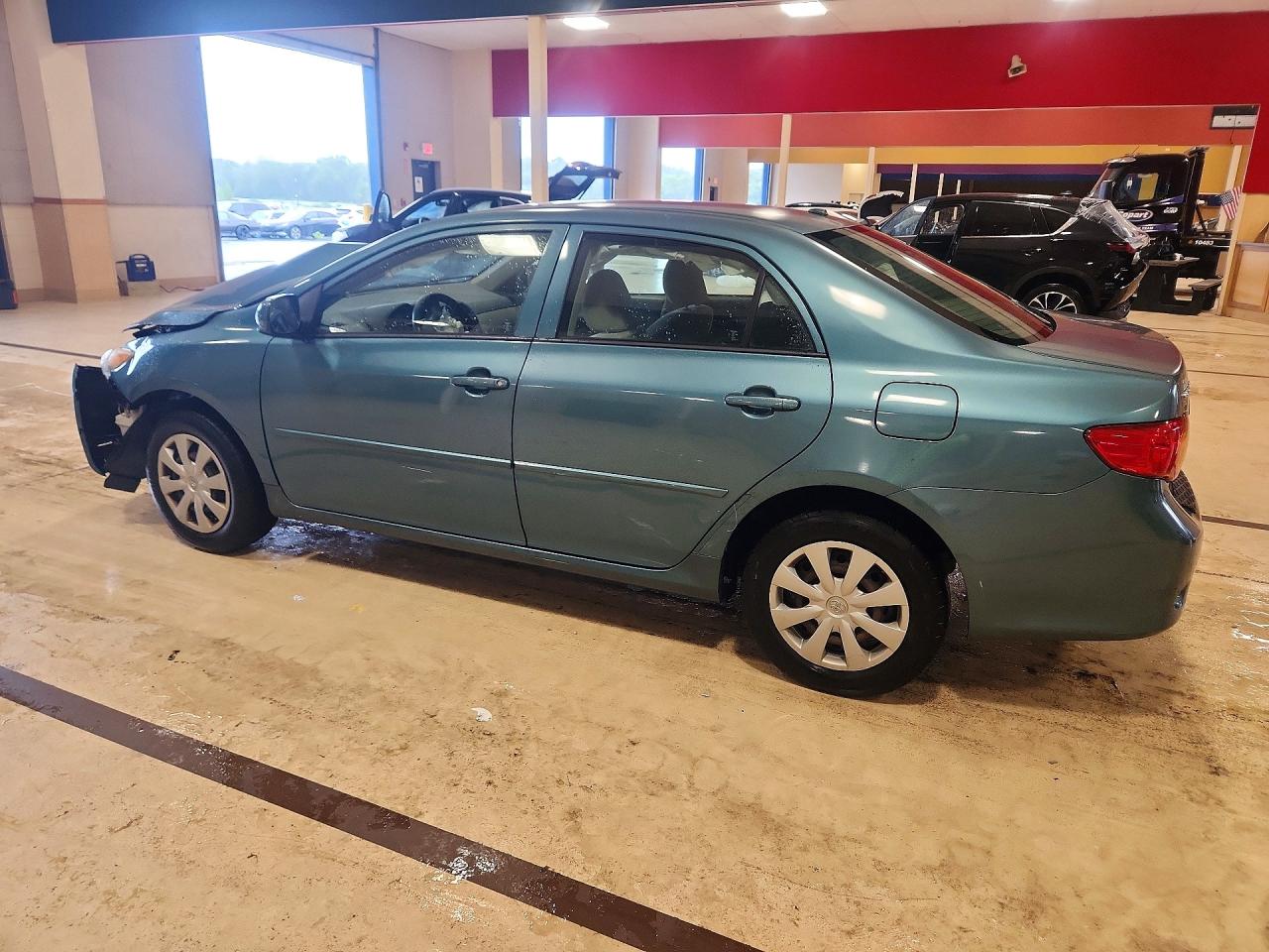 2010 Toyota Corolla Le Gray vin: JTDBU4EE0A9118443