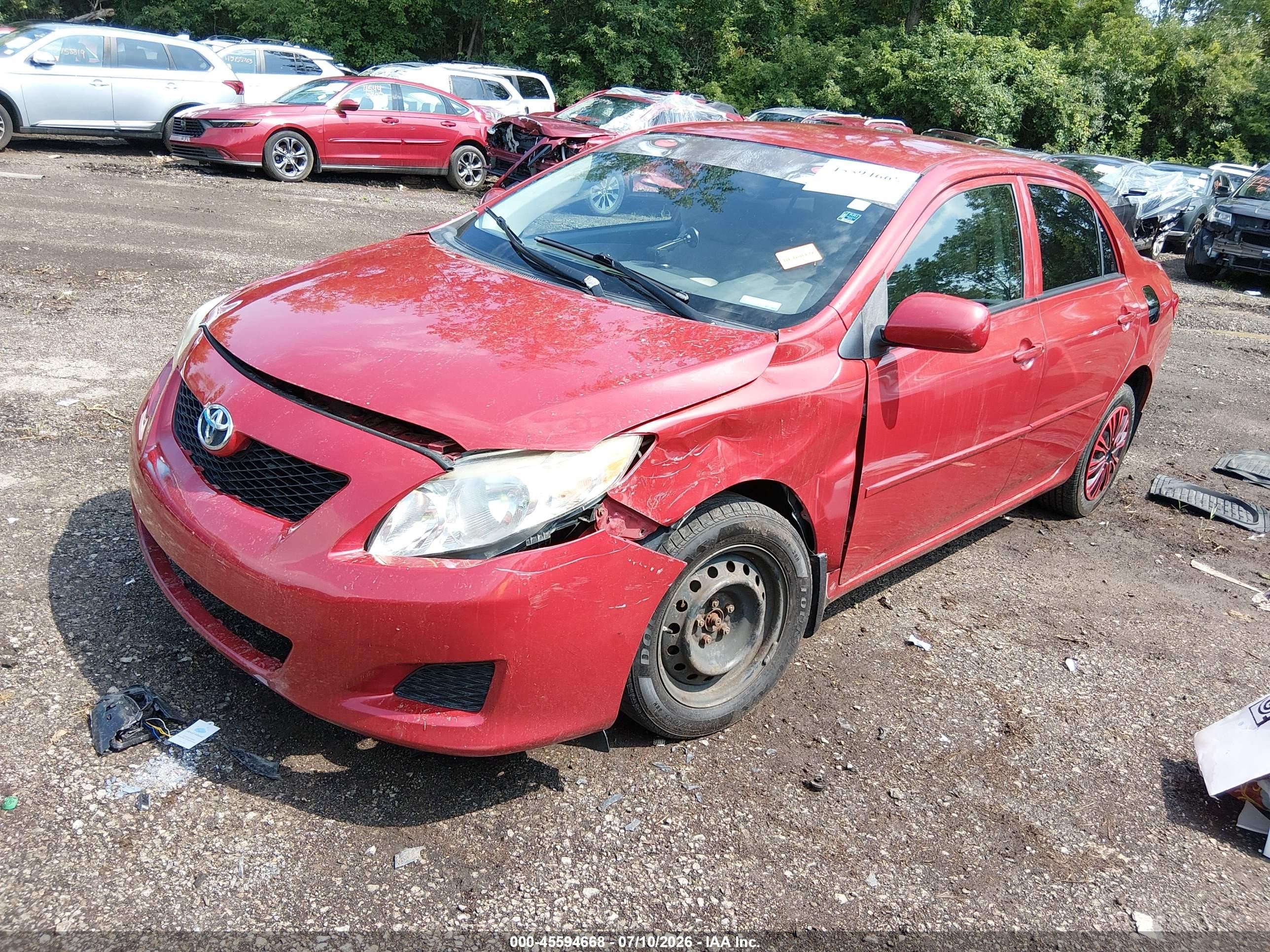 2010 Toyota Corolla Le Red vin: JTDBU4EE0AJ068965