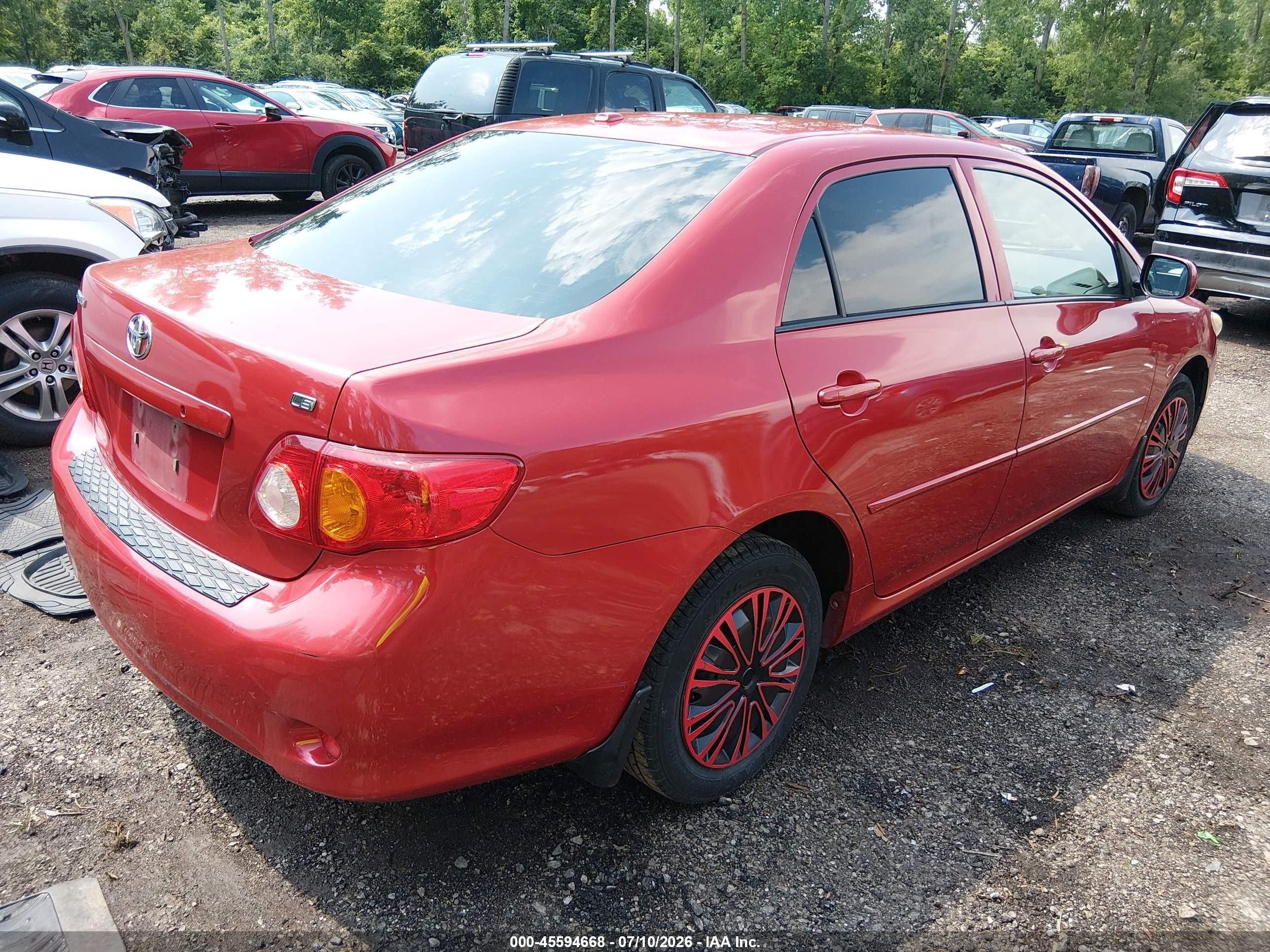 2010 Toyota Corolla Le Red vin: JTDBU4EE0AJ068965