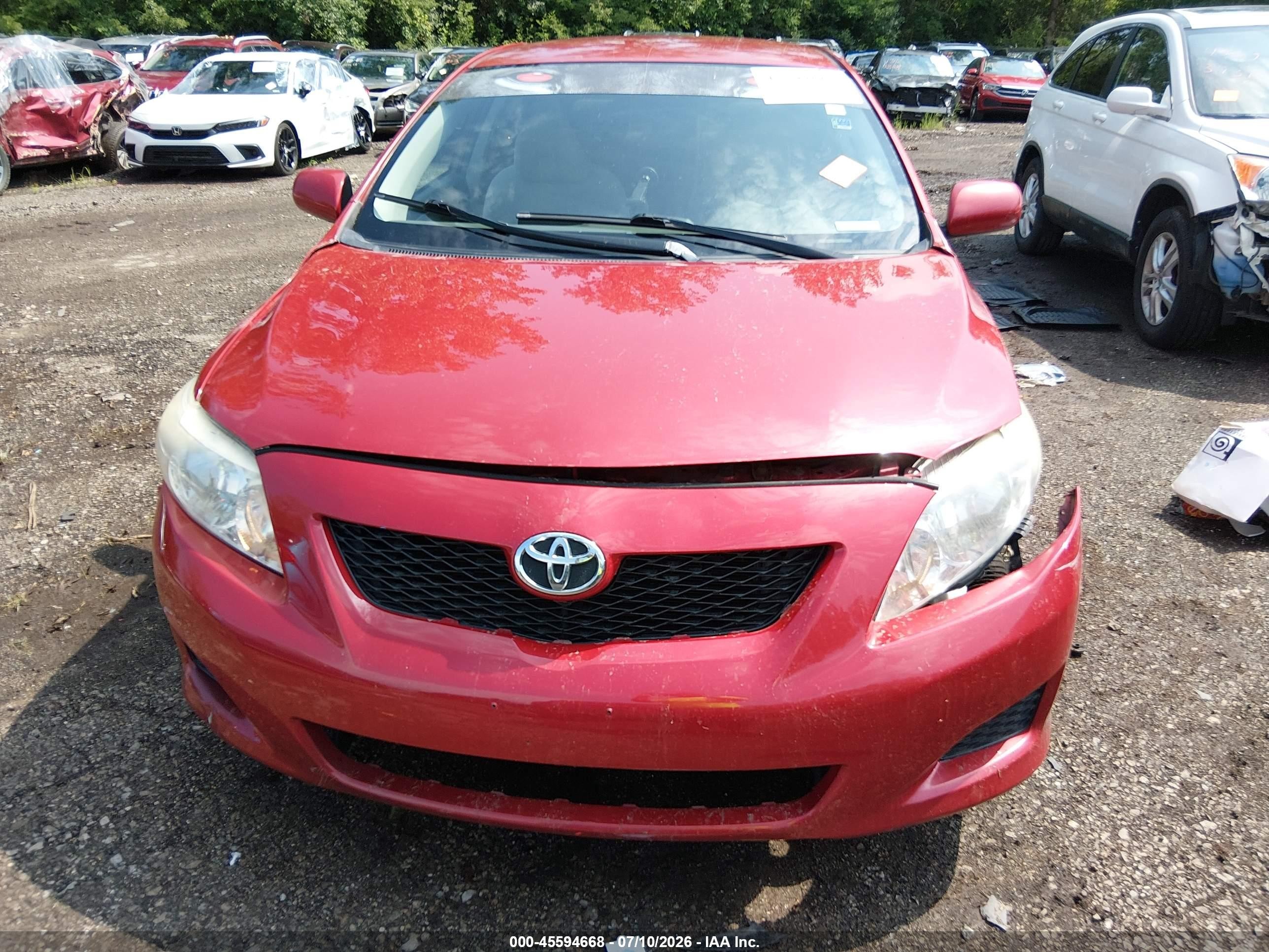2010 Toyota Corolla Le Red vin: JTDBU4EE0AJ068965