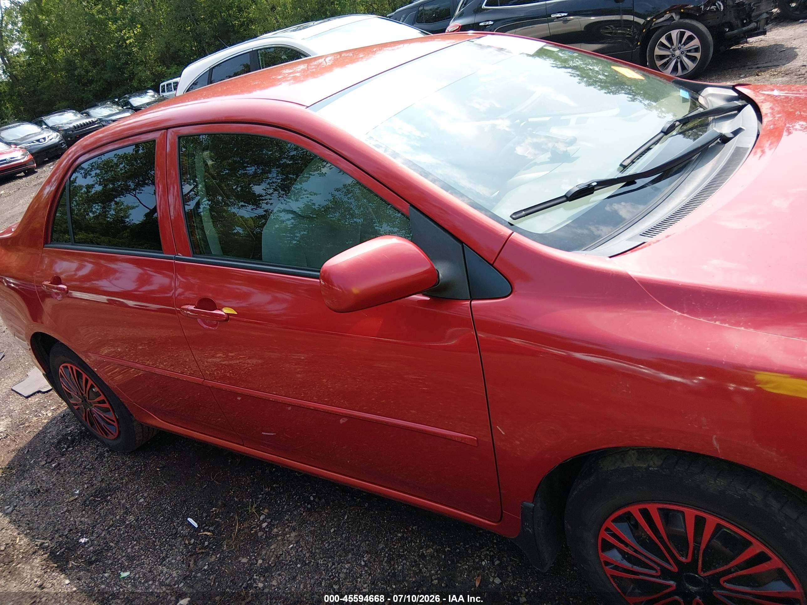 2010 Toyota Corolla Le Red vin: JTDBU4EE0AJ068965