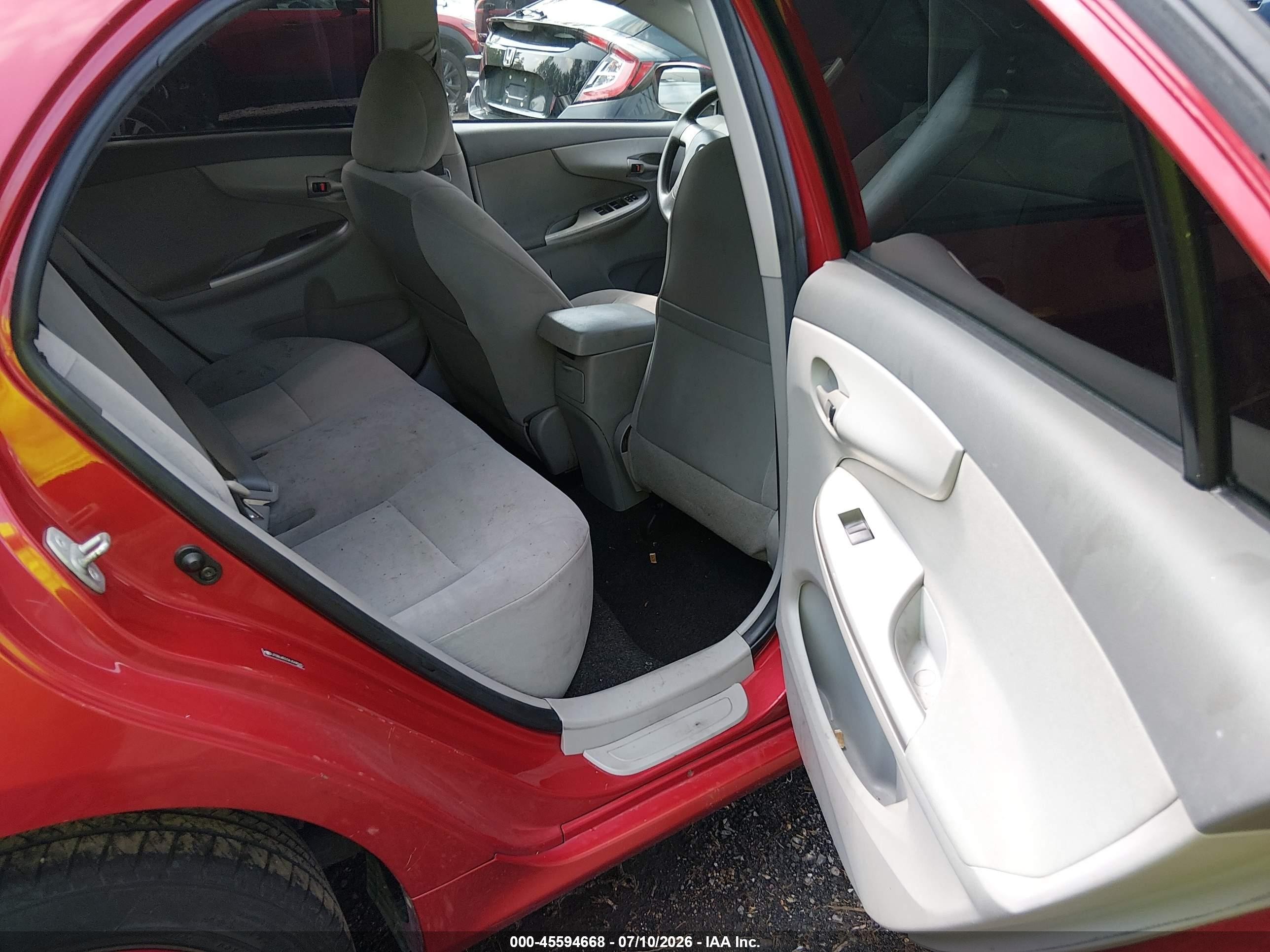 2010 Toyota Corolla Le Red vin: JTDBU4EE0AJ068965