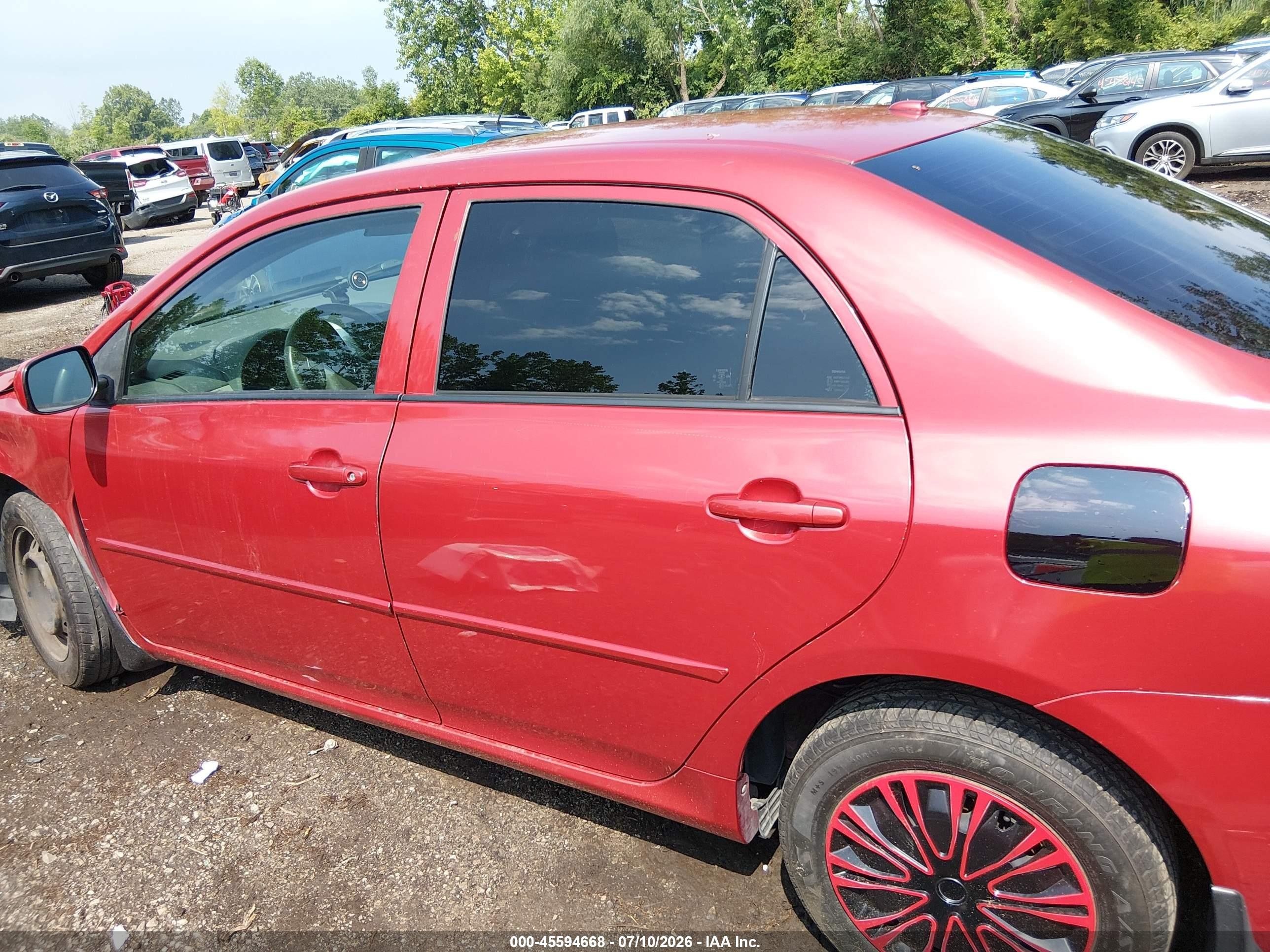 2010 Toyota Corolla Le Red vin: JTDBU4EE0AJ068965
