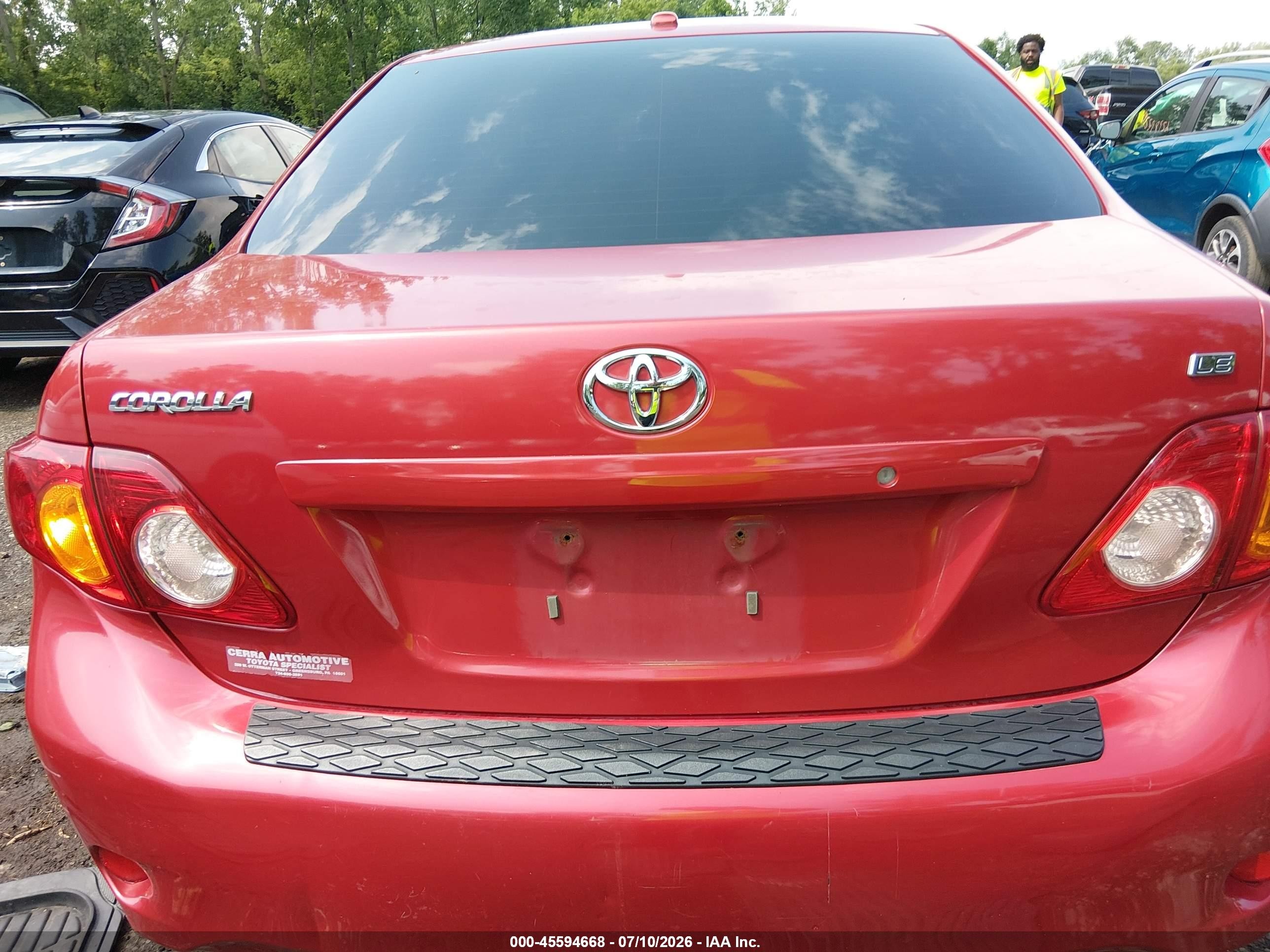 2010 Toyota Corolla Le Red vin: JTDBU4EE0AJ068965
