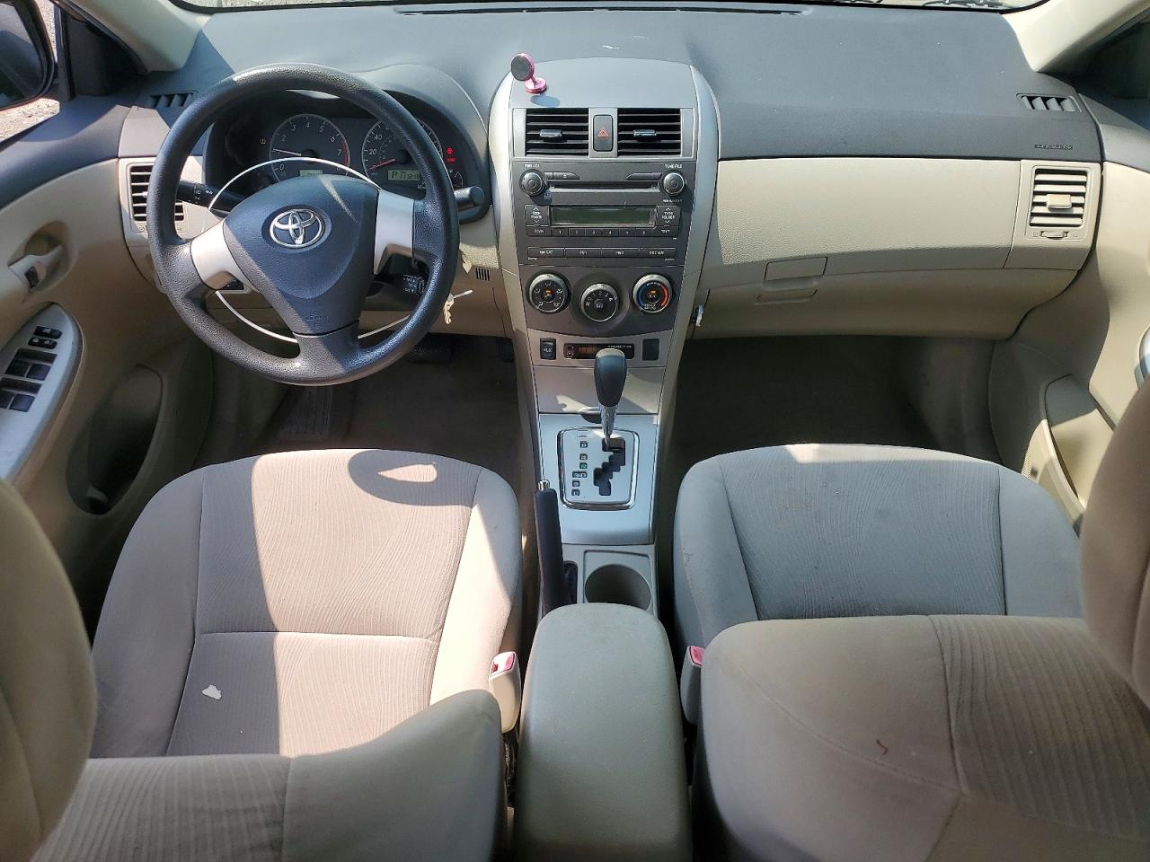 2011 Toyota Corolla Le Gold vin: JTDBU4EE0B9126060