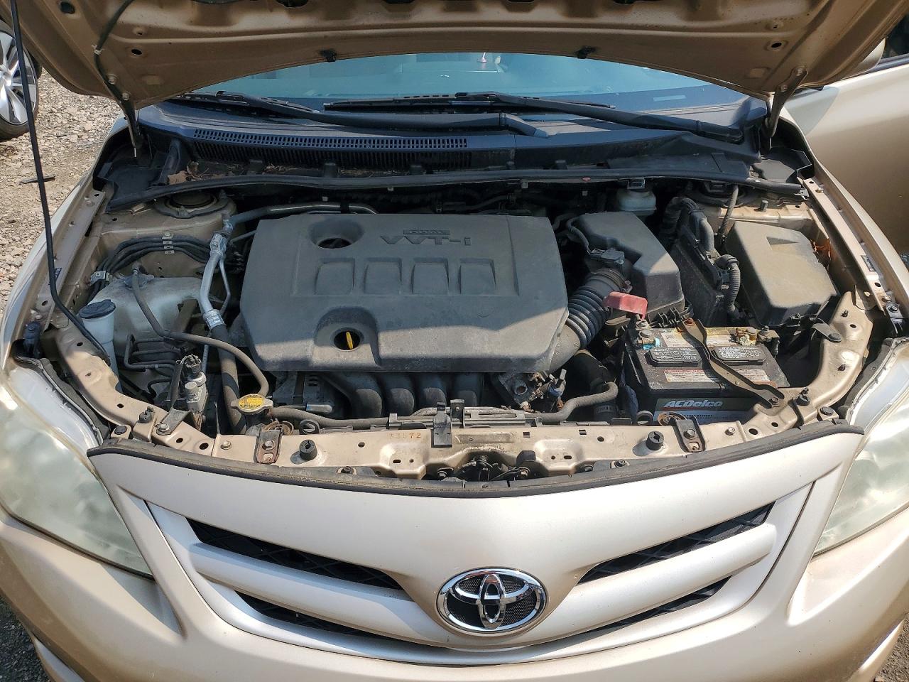 2011 Toyota Corolla Le Gold vin: JTDBU4EE0B9126060