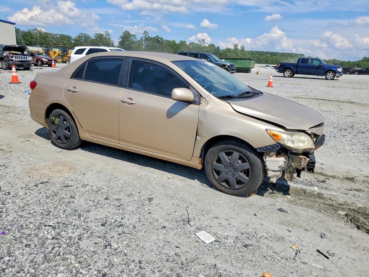 2011 Toyota Corolla Le Gold vin: JTDBU4EE0B9138662