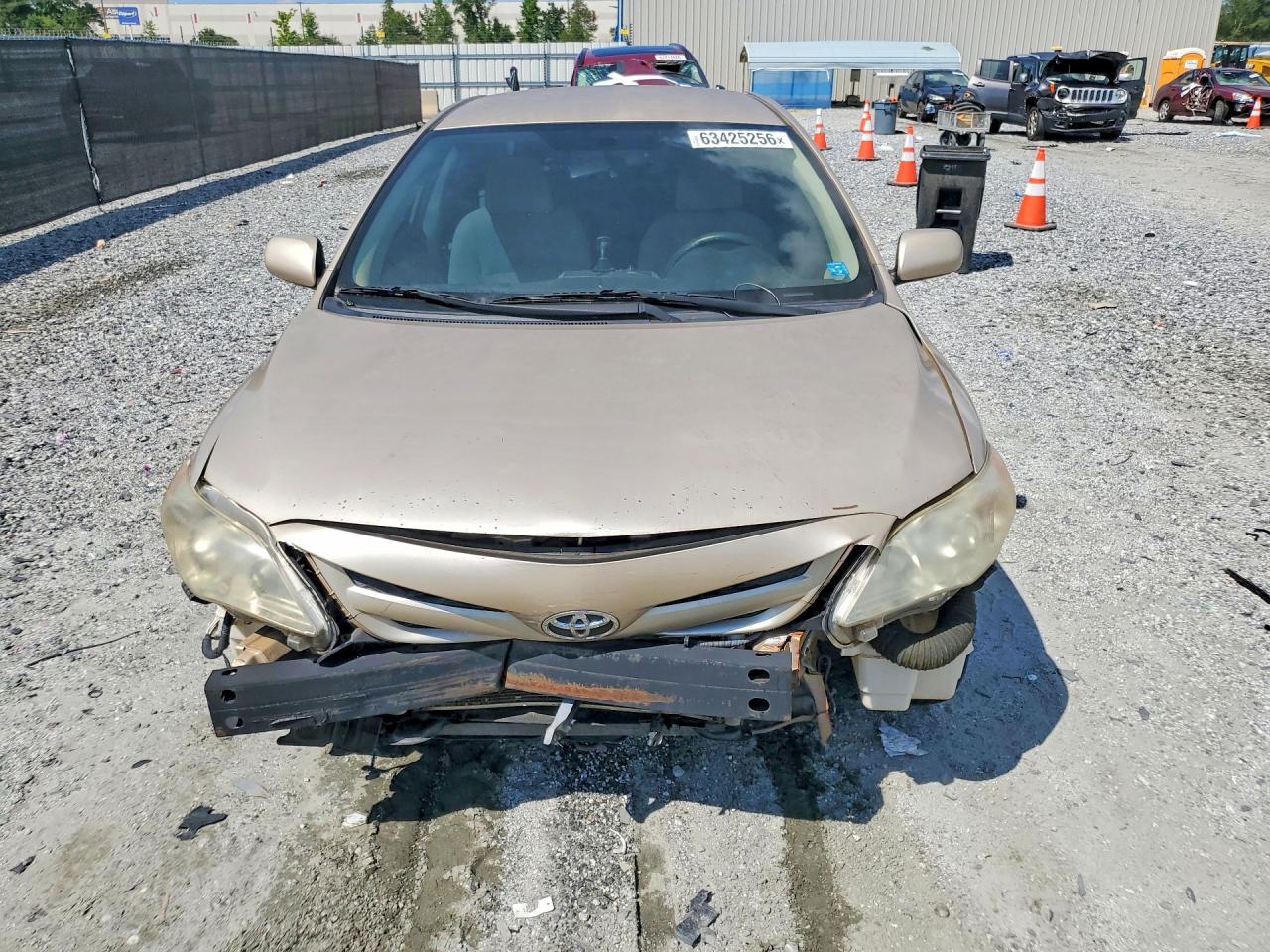 2011 Toyota Corolla Le Gold vin: JTDBU4EE0B9138662