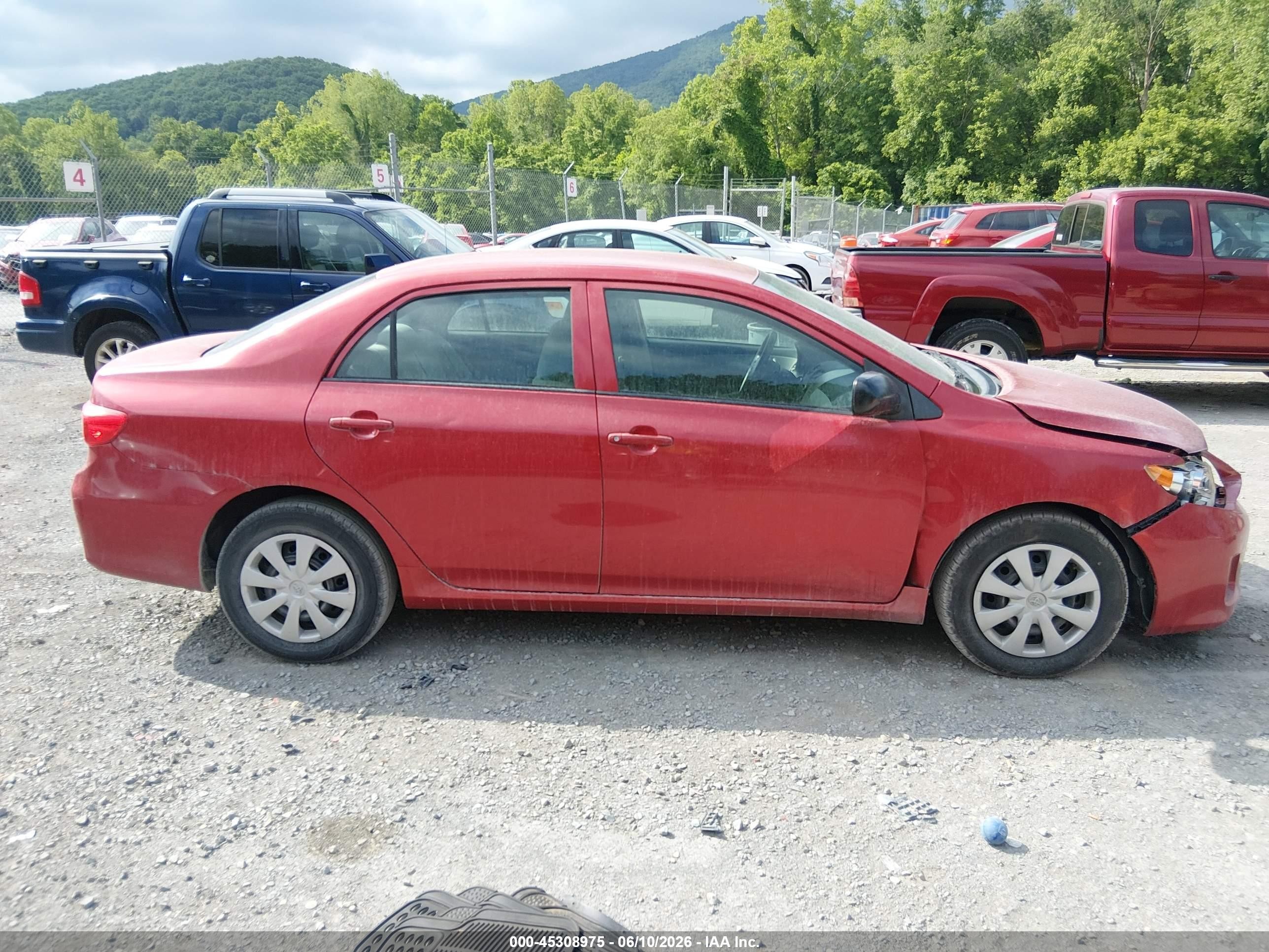 2011 Toyota Corolla   Red vin: JTDBU4EE0BJ107670