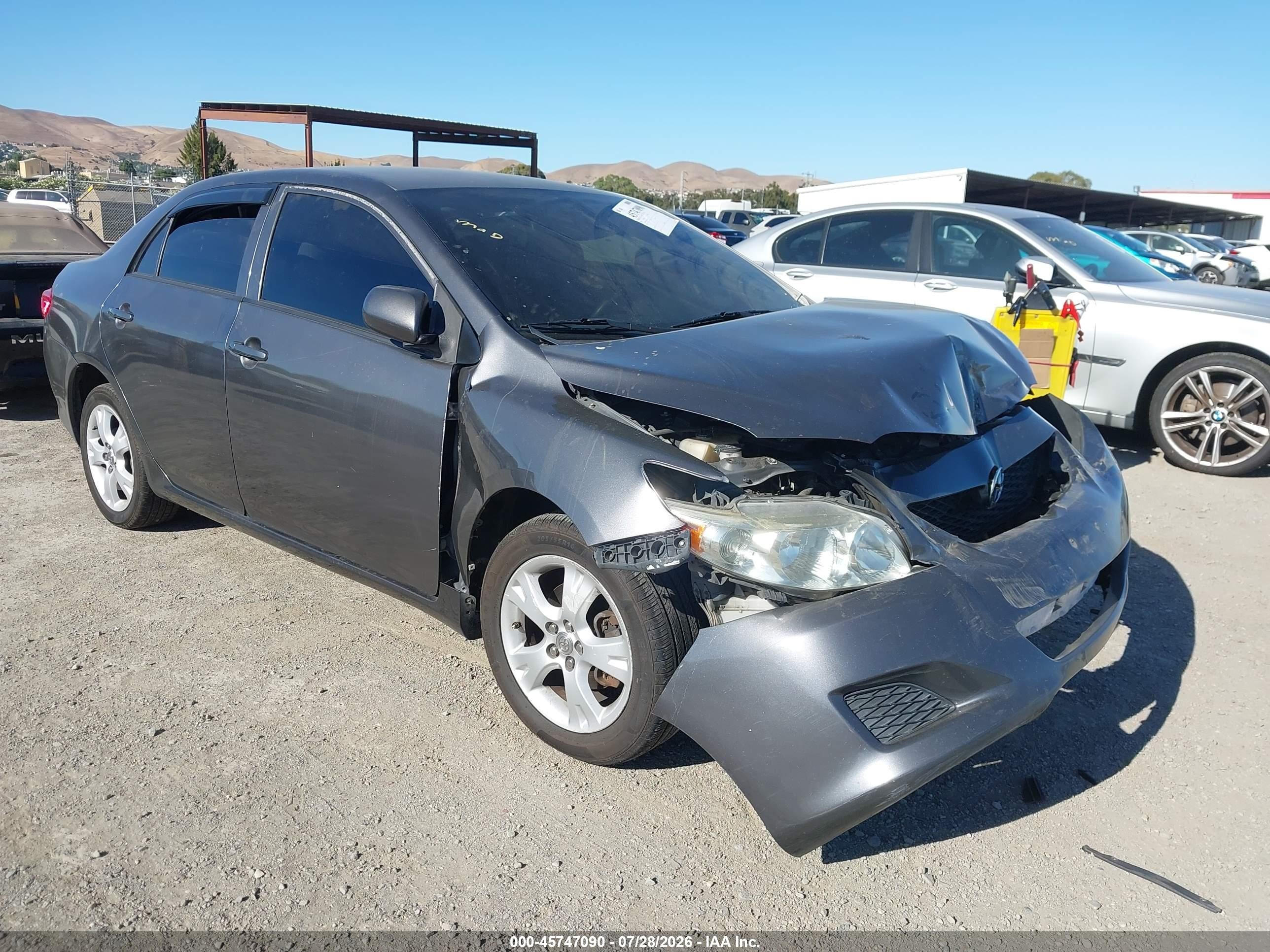 2010 Toyota Corolla Le Gray vin: JTDBU4EE1AJ070398