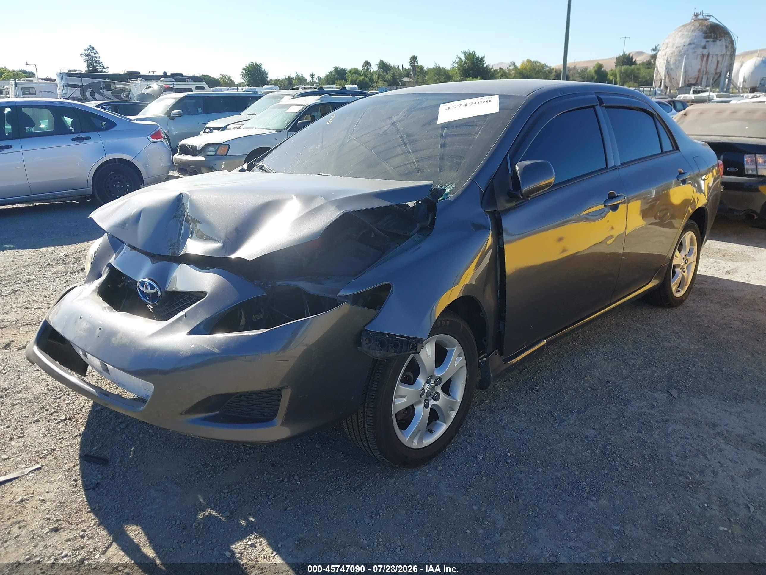 2010 Toyota Corolla Le Gray vin: JTDBU4EE1AJ070398
