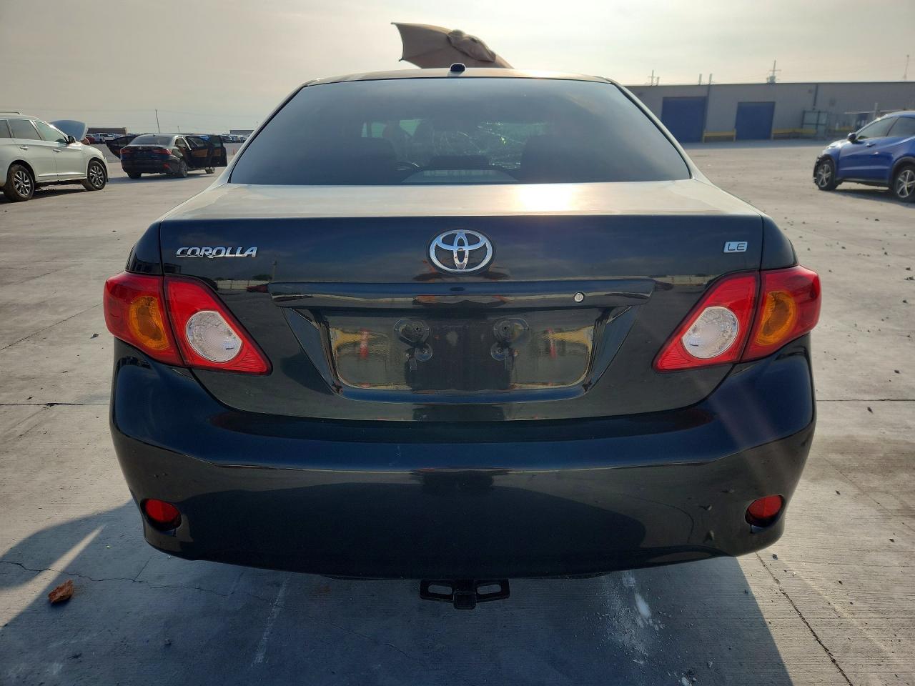 2010 Toyota Corolla Le Black vin: JTDBU4EE1AJ075682