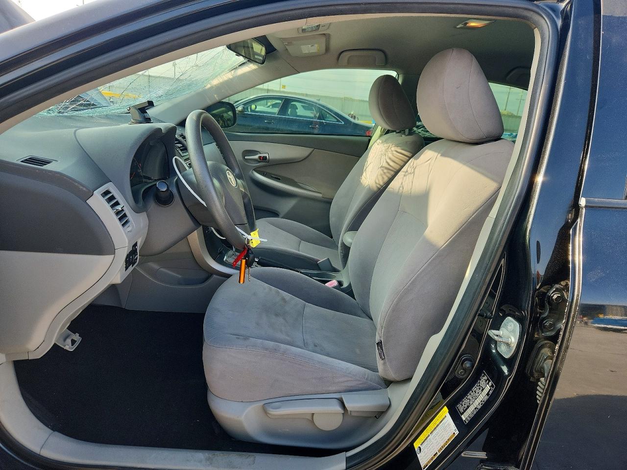 2010 Toyota Corolla Le Black vin: JTDBU4EE1AJ075682