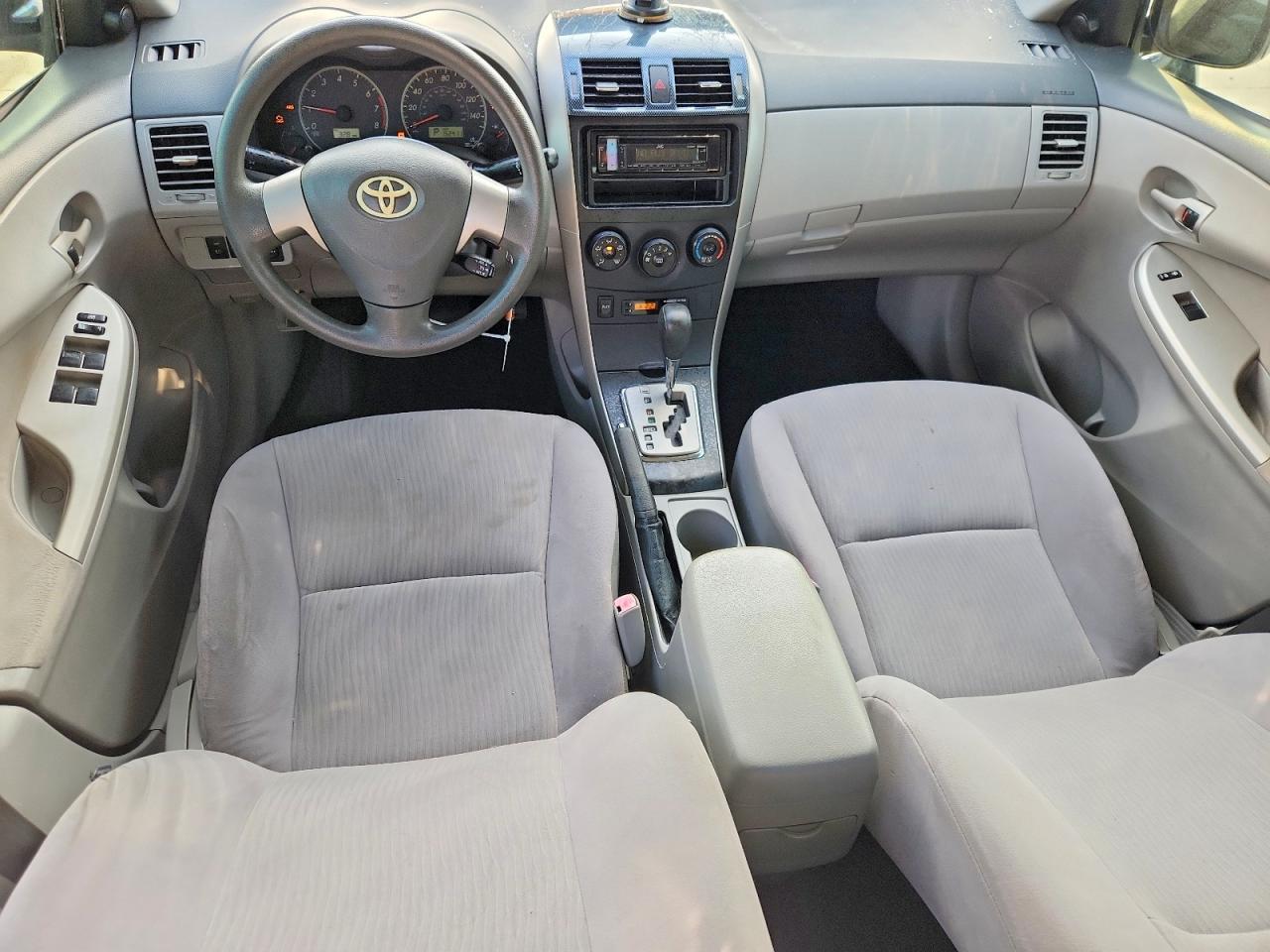 2010 Toyota Corolla Le Black vin: JTDBU4EE1AJ075682