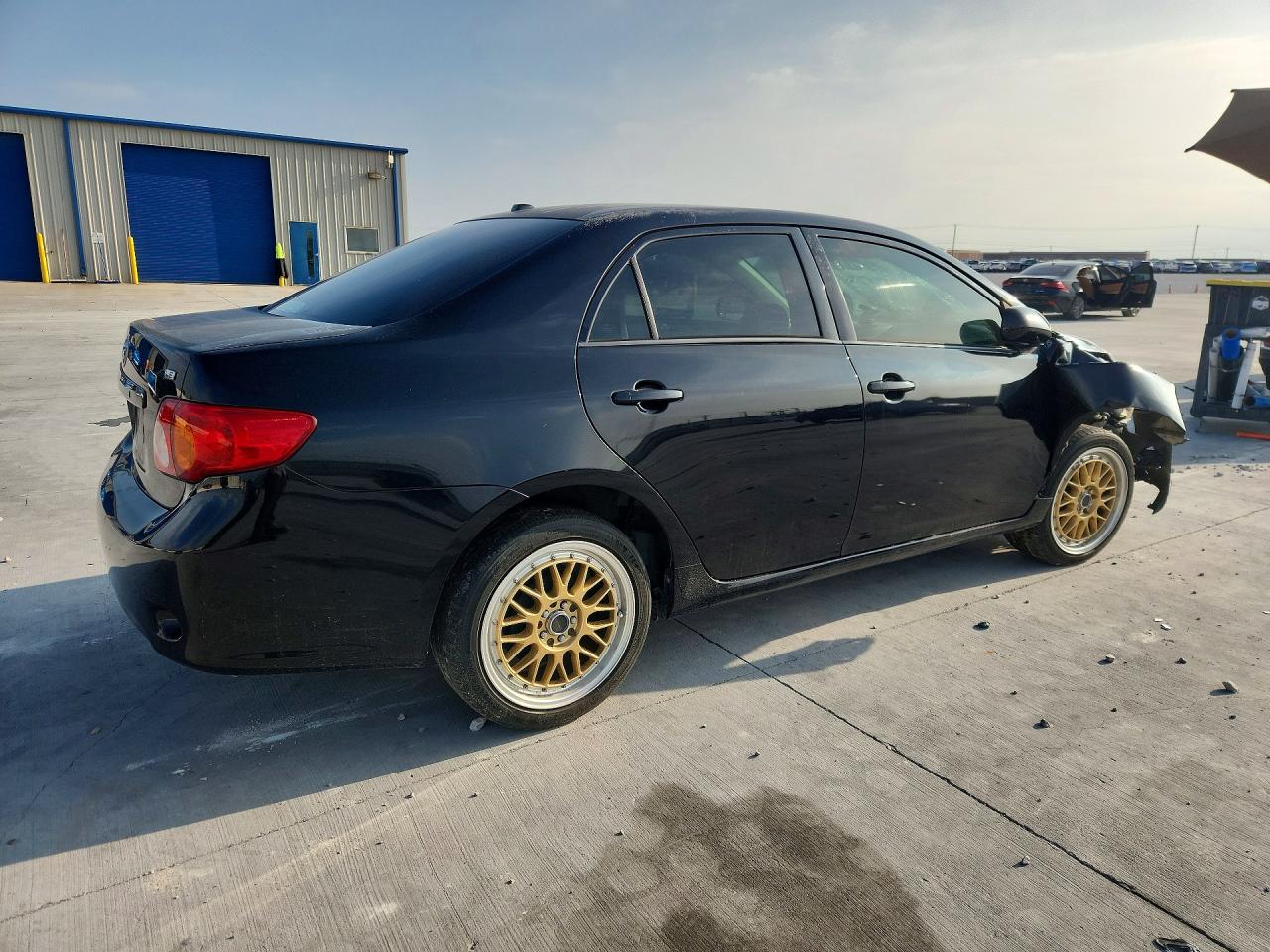 2010 Toyota Corolla Le Black vin: JTDBU4EE1AJ075682