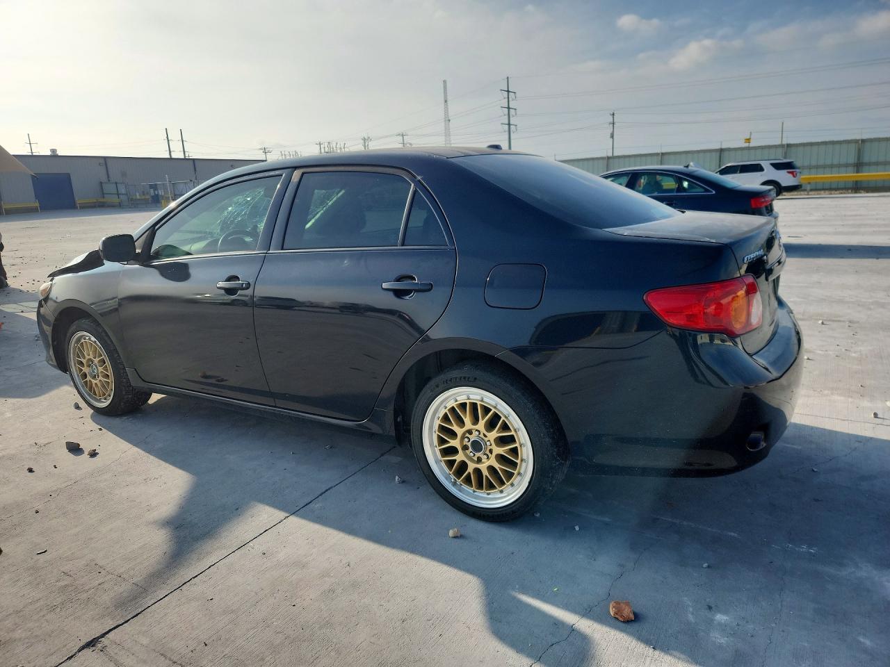 2010 Toyota Corolla Le Black vin: JTDBU4EE1AJ075682